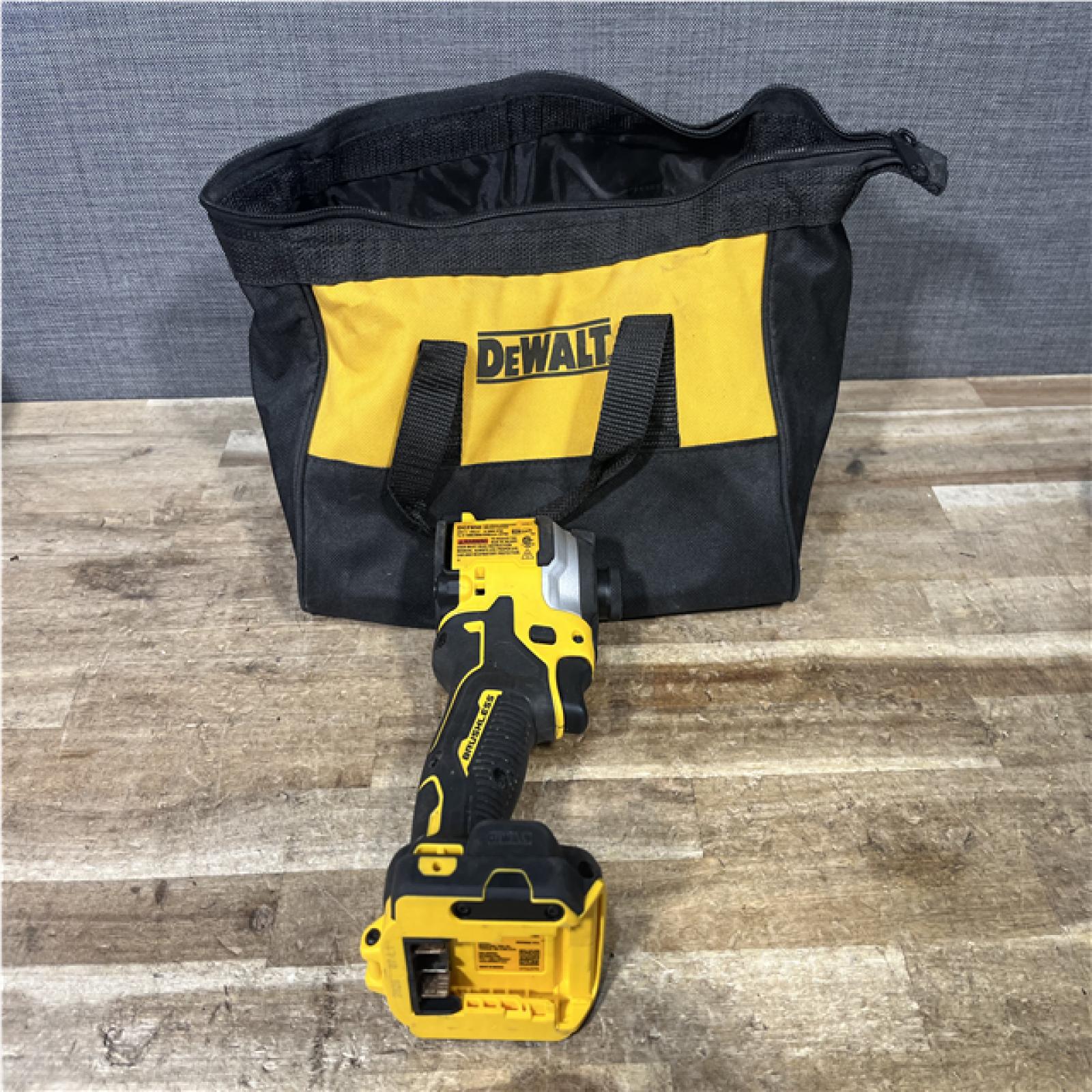 Houston Location AS-IS DEWALT ATOMIC 20V MAX Cordless Brushless Compact 1/4 in. Impact Driver (Tool Only)