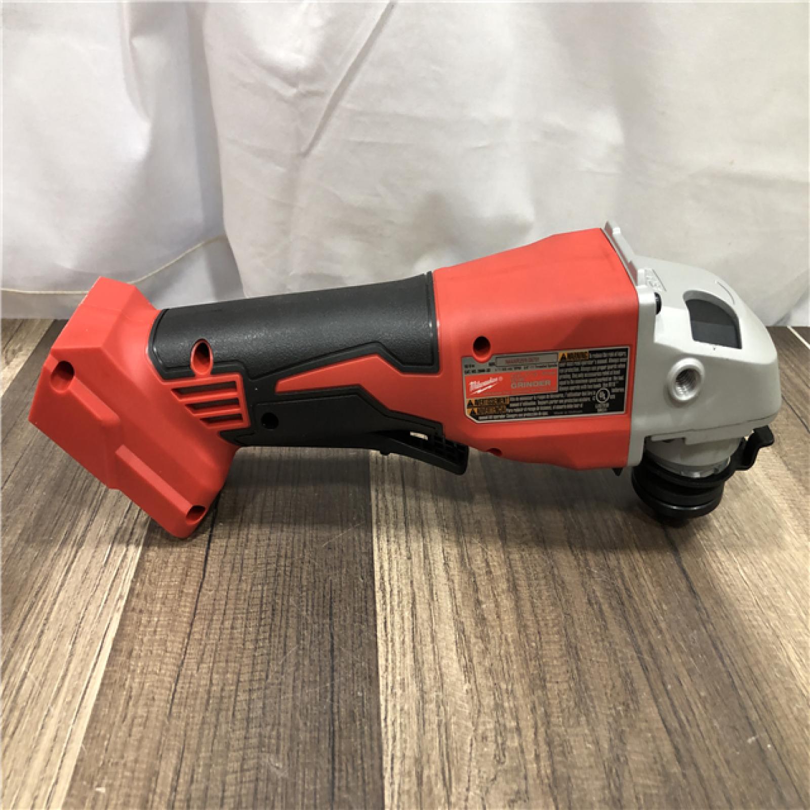AS-IS Milwaukee 18V Lithium-Ion Brushless Cordless 4-1/2 in./5 in. Grinder w/Paddle Switch (Tool-Only)