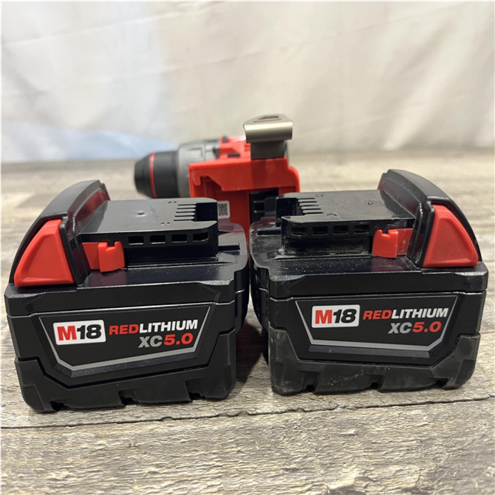 AS-IS Milwaukee FUEL 18V Lithium-Ion Brushless Cordless 1/2 in. Hammer Drill Driver Kit