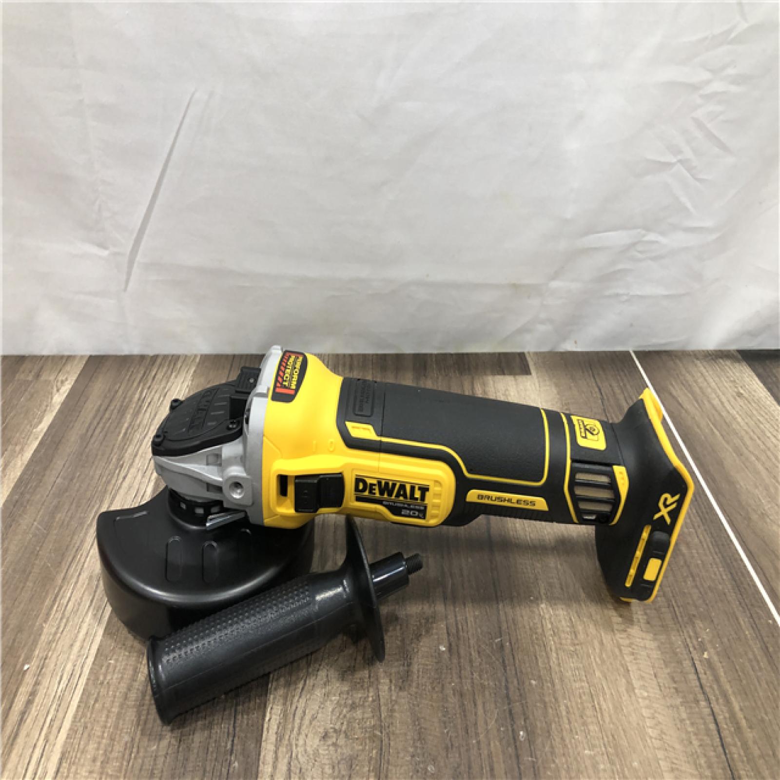 AS-IS DEWALT 20V MAX XR Cordless Brushless 4.5 in. Slide Switch Small Angle Grinder with Kickback Brake (Tool Only)