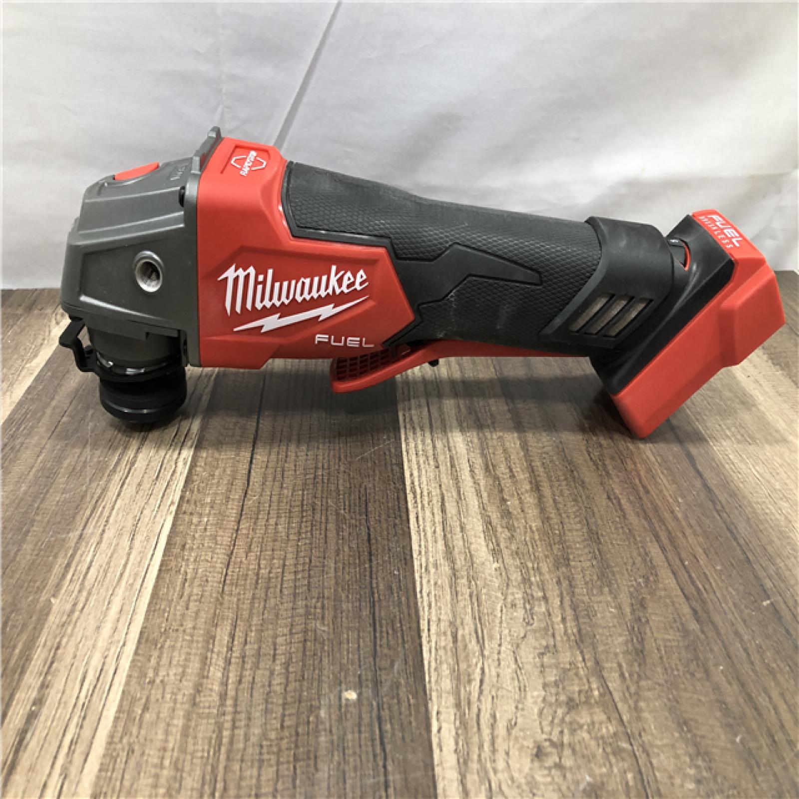 AS-IS Milwaukee FUEL 18V Lithium-Ion Brushless Cordless 4-1/2 in./5 in. Grinder with Variable Speed & Paddle Switch (Tool-Only)