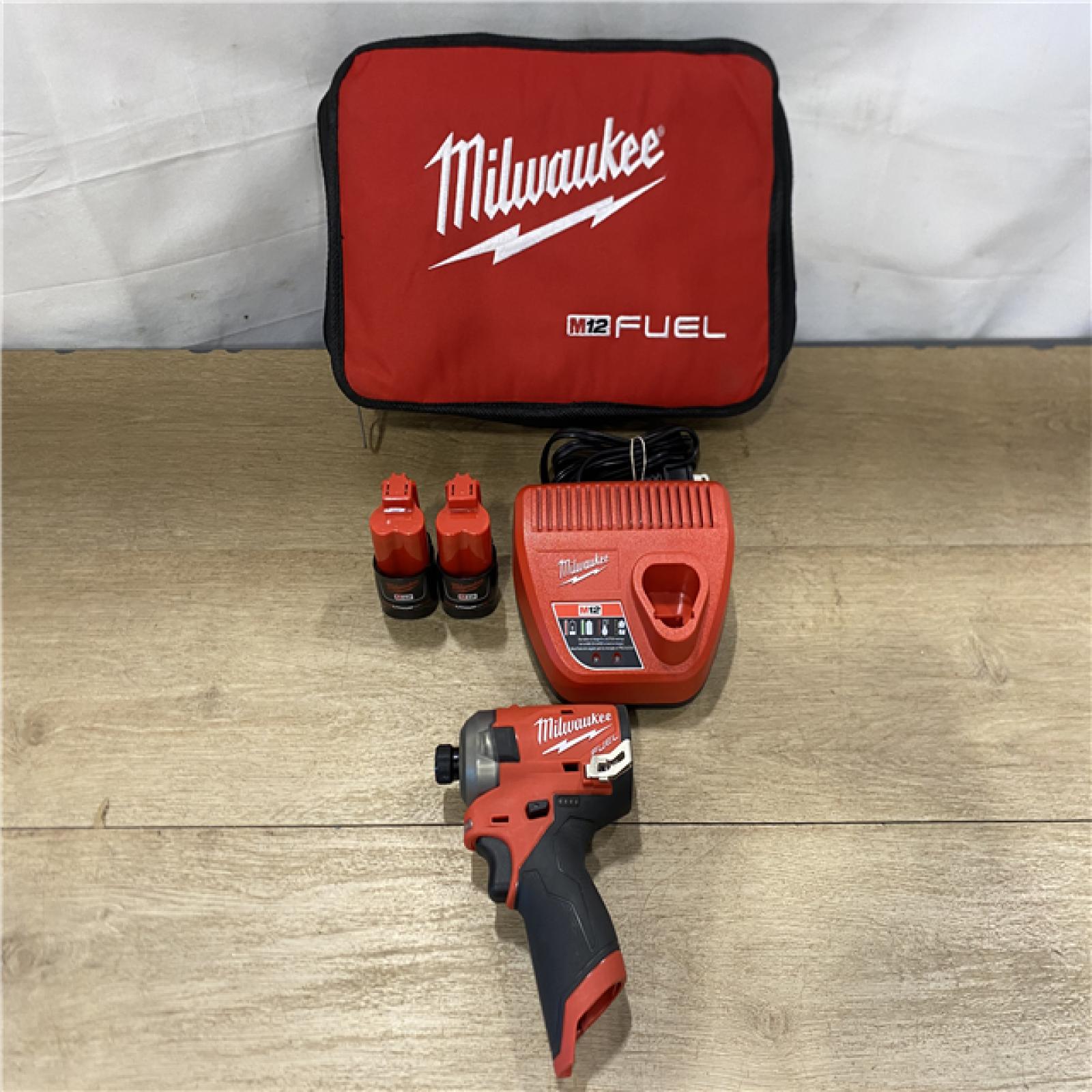 AS-IS Milwaukee FUEL SURGE 12V Lithium-Ion Brushless Cordless 1/4 in. Hex Impact Driver Compact Kit