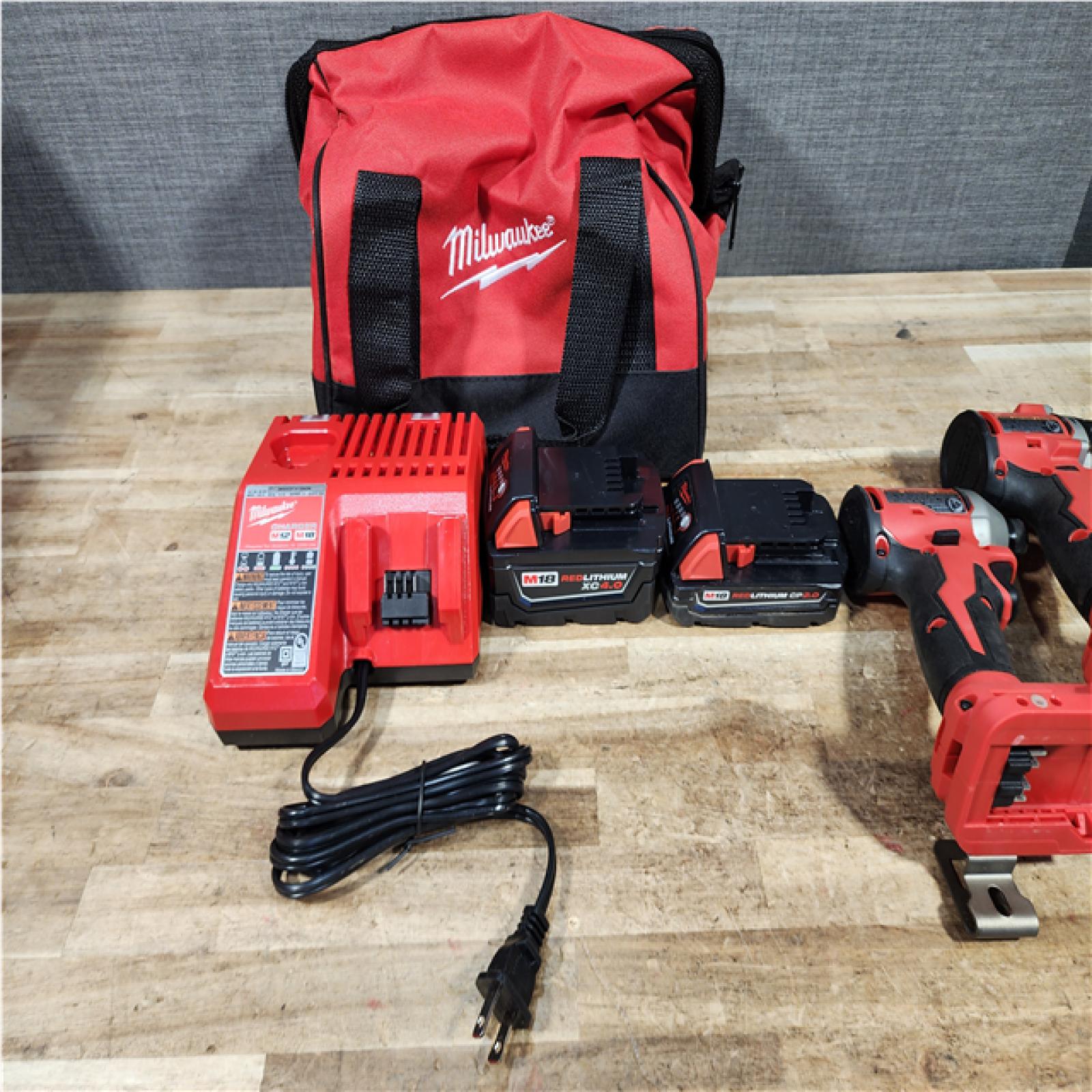 HOUSTON LOCATION - AS - IS Milwaukee 18-Volt Lithium-Ion Brushless Cordless Compact Hammer Drill/Impact Combo Kit