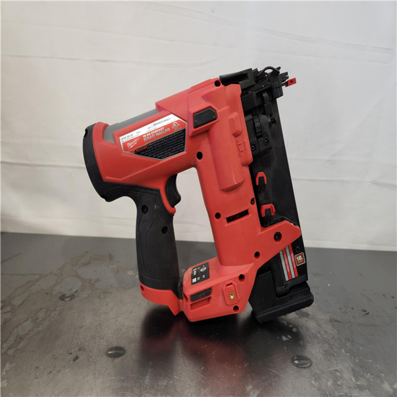 AS-IS- M12 FUEL 12-Volt Lithium-Ion Brushless Cordless 18-Guage Compact Brad Nailer (Tool Only)