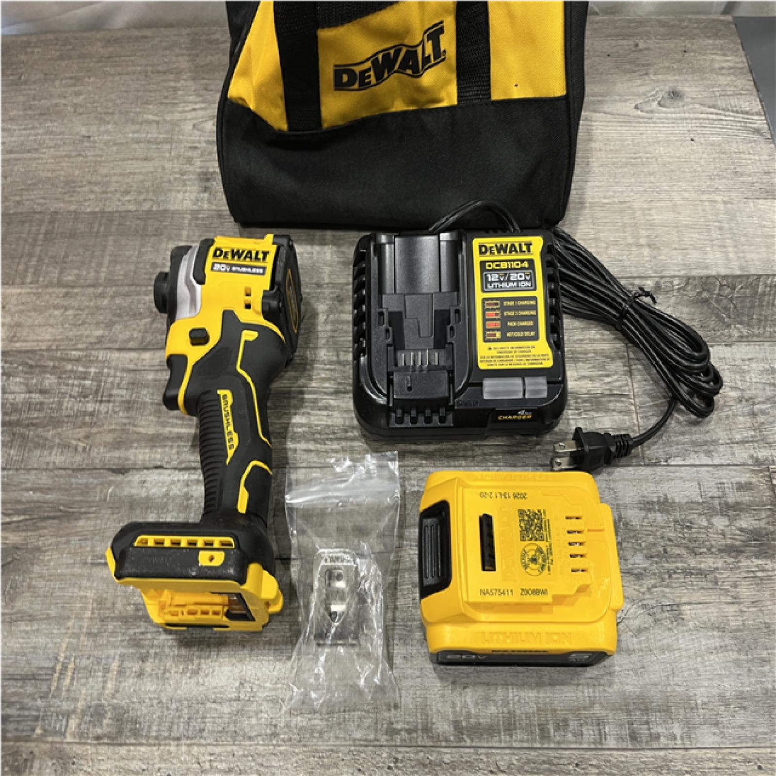 AS-IS DEWALT ATOMIC 20V MAX Lithium-Ion Cordless 1/4 in. Brushless Impact Driver Kit