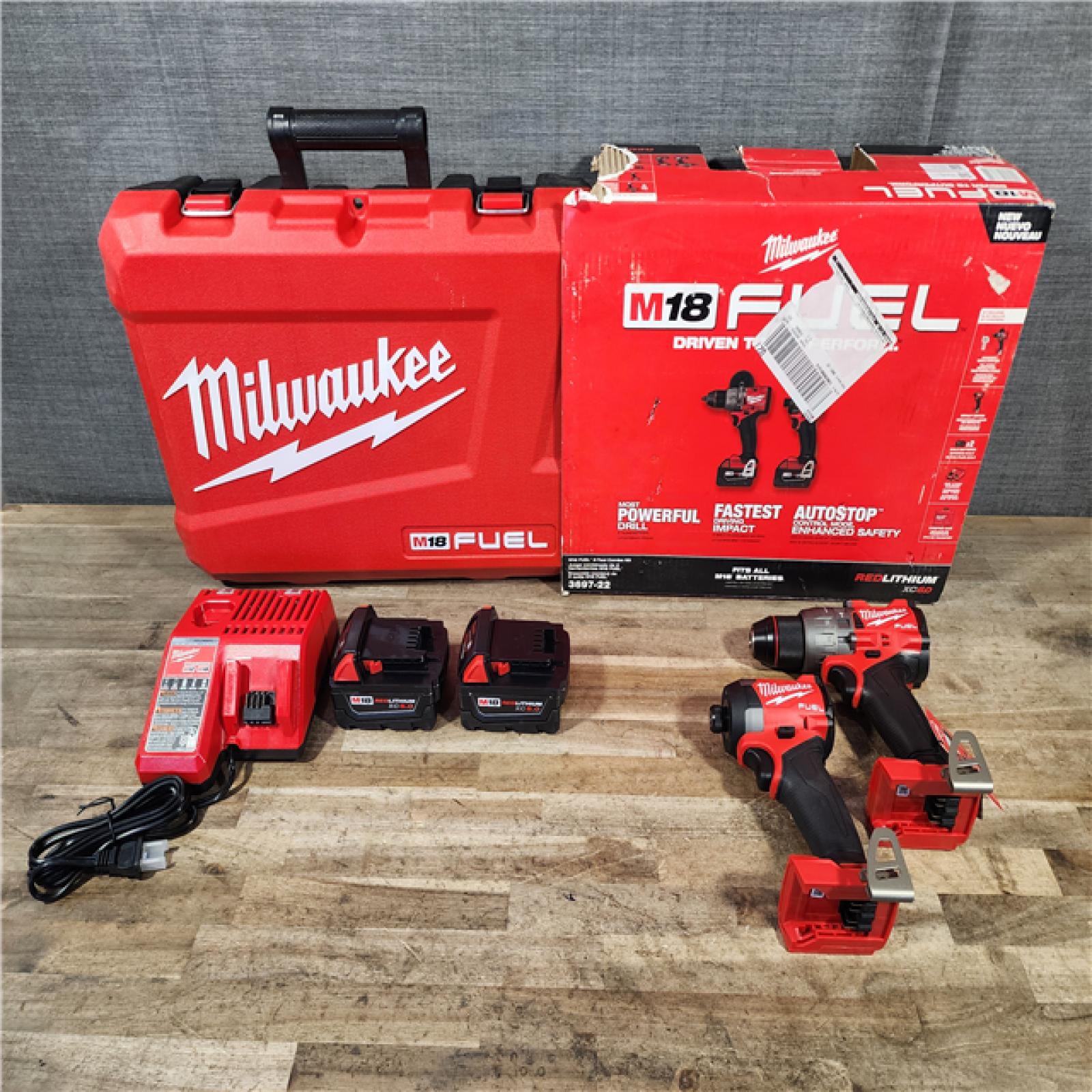HOUSTON LOCATION - AS-IS (APPEARS LIKE NEW) Milwaukee FUEL 18V Lithium-Ion Brushless Cordless Hammer Drill and Impact Driver Combo Kit