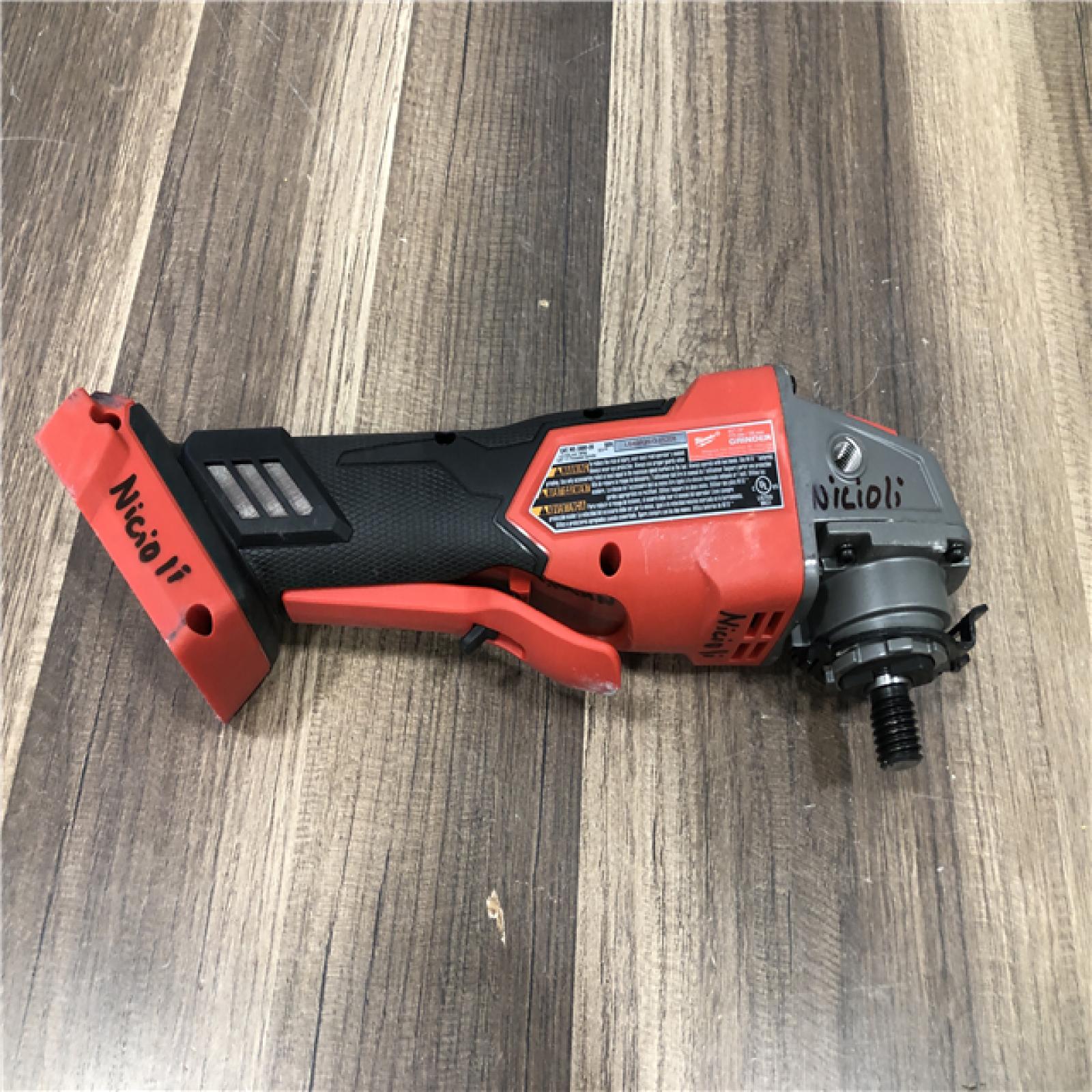 AS-IS Milwaukee FUEL 18V Lithium-Ion Brushless Cordless 4-1/2 in./5 in. Grinder w/Paddle Switch (Tool-Only)