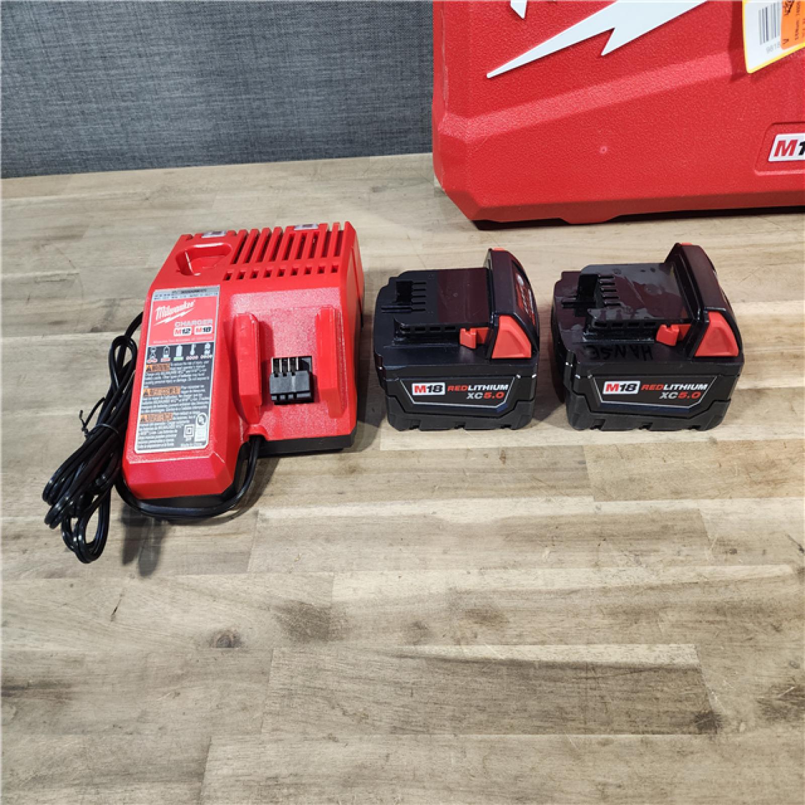 HOUSTON LOCATION - AS-IS MILWAUKEE FUEL 18V Lithium-Ion Brushless Cordless Hammer Drill and Impact Driver Combo Kit (2-Tool) with 2 Batteries