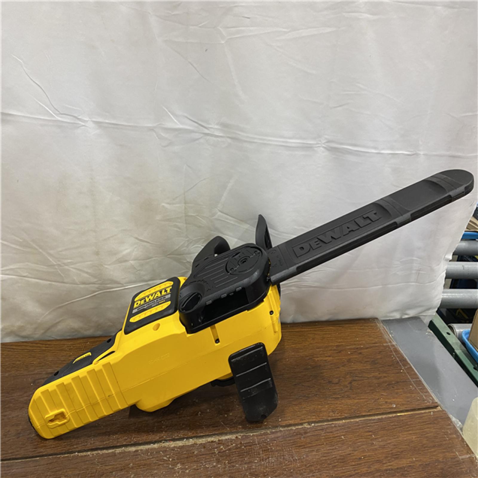 AS-IS DEWALT  FLEXVOLT 60V MAX 16in. Brushless Cordless Battery Powered Chainsaw Kit with (1) FLEXVOLT 2 Ah Battery & Charger