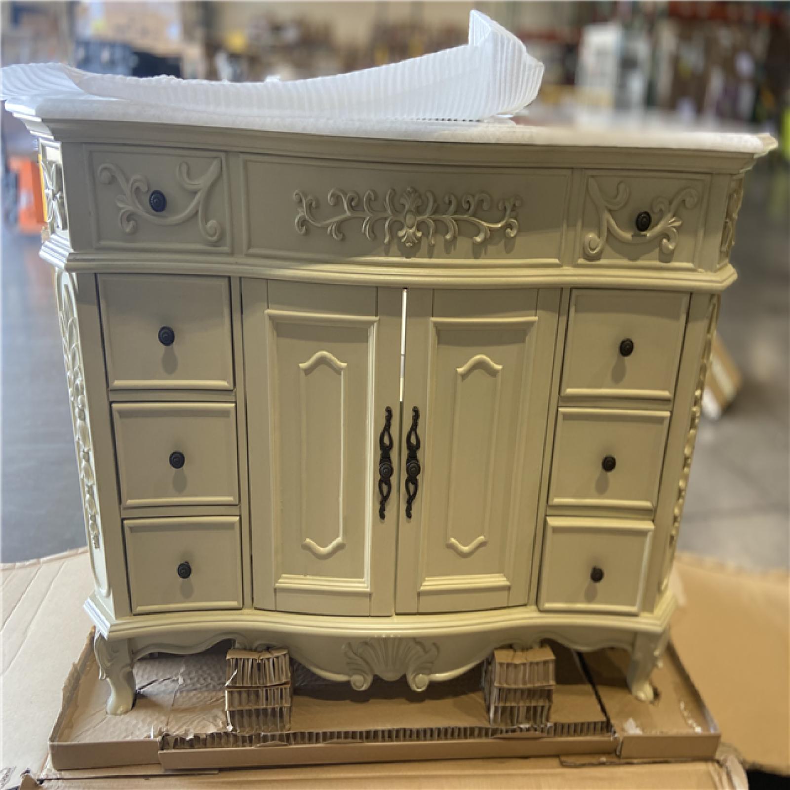 DALLAS LOCATION - Home Decorators Collection Winslow 48 in. W x 22 in. D x 35 in. H Single Sink Freestanding Bath Vanity in Antique White with White Marble Top