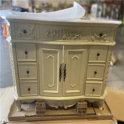 DALLAS LOCATION - Home Decorators Collection Winslow 48 in. W x 22 in. D x 35 in. H Single Sink Freestanding Bath Vanity in Antique White with White Marble Top