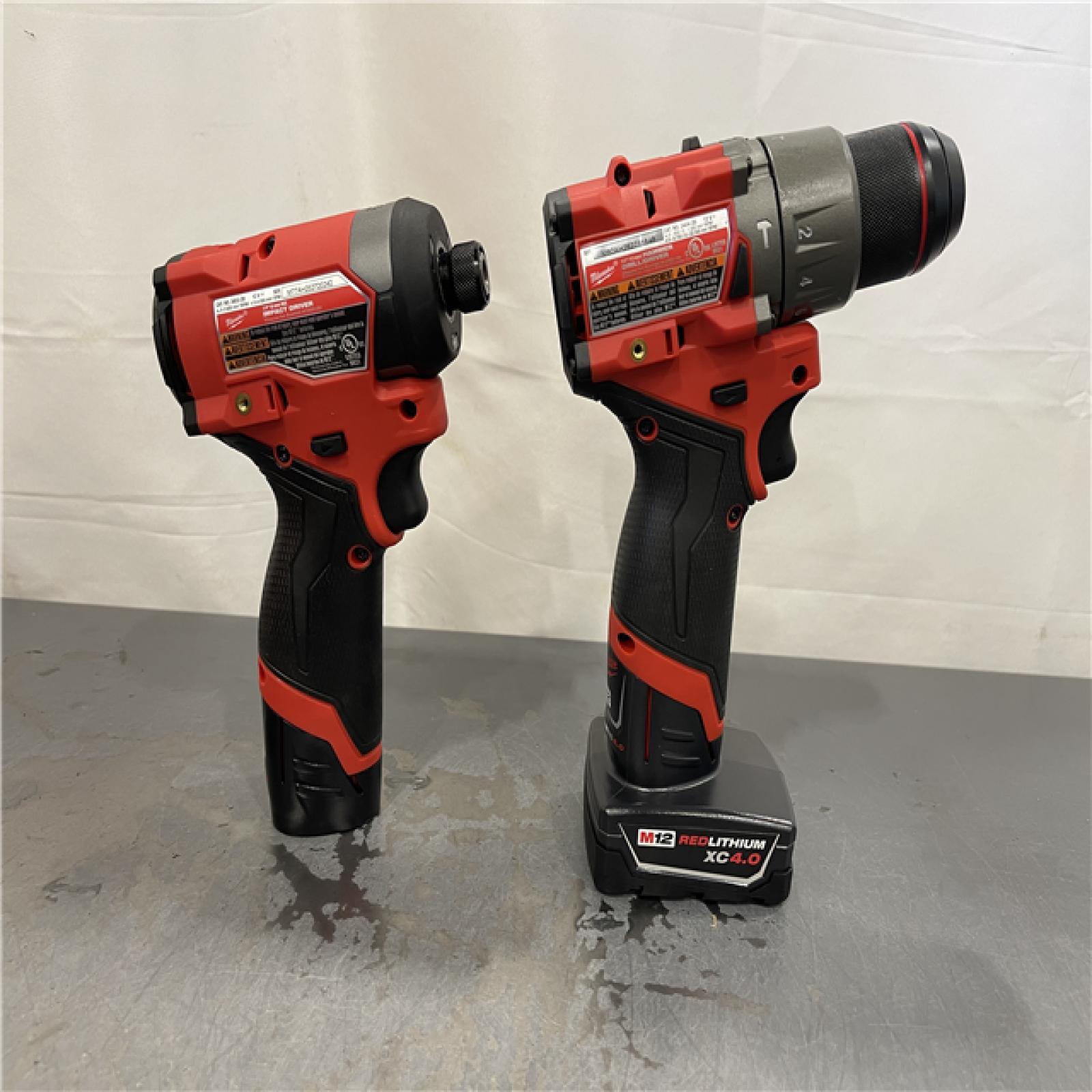 AS-IS - Milwaukee M12 FUEL 12-Volt Lithium-Ion Brushless Cordless Hammer Drill and Impact Driver Combo Kit