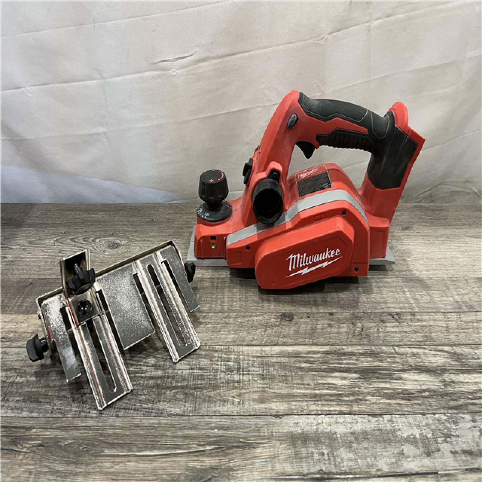 AS-IS Milwaukee 18V Lithium-Ion Cordless 3-1/4 in. Planer (Tool-Only)