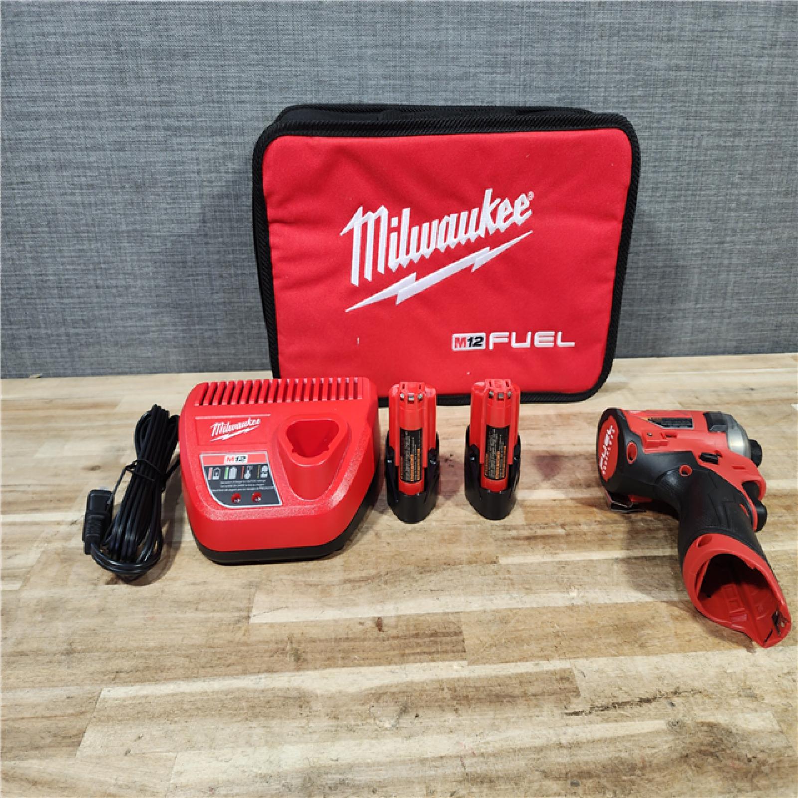 HOUSTON LOCATION - AS - IS Milwaukee FUEL SURGE 12V Lithium-Ion Brushless Cordless 1/4 in. Hex Impact Driver Compact Kit