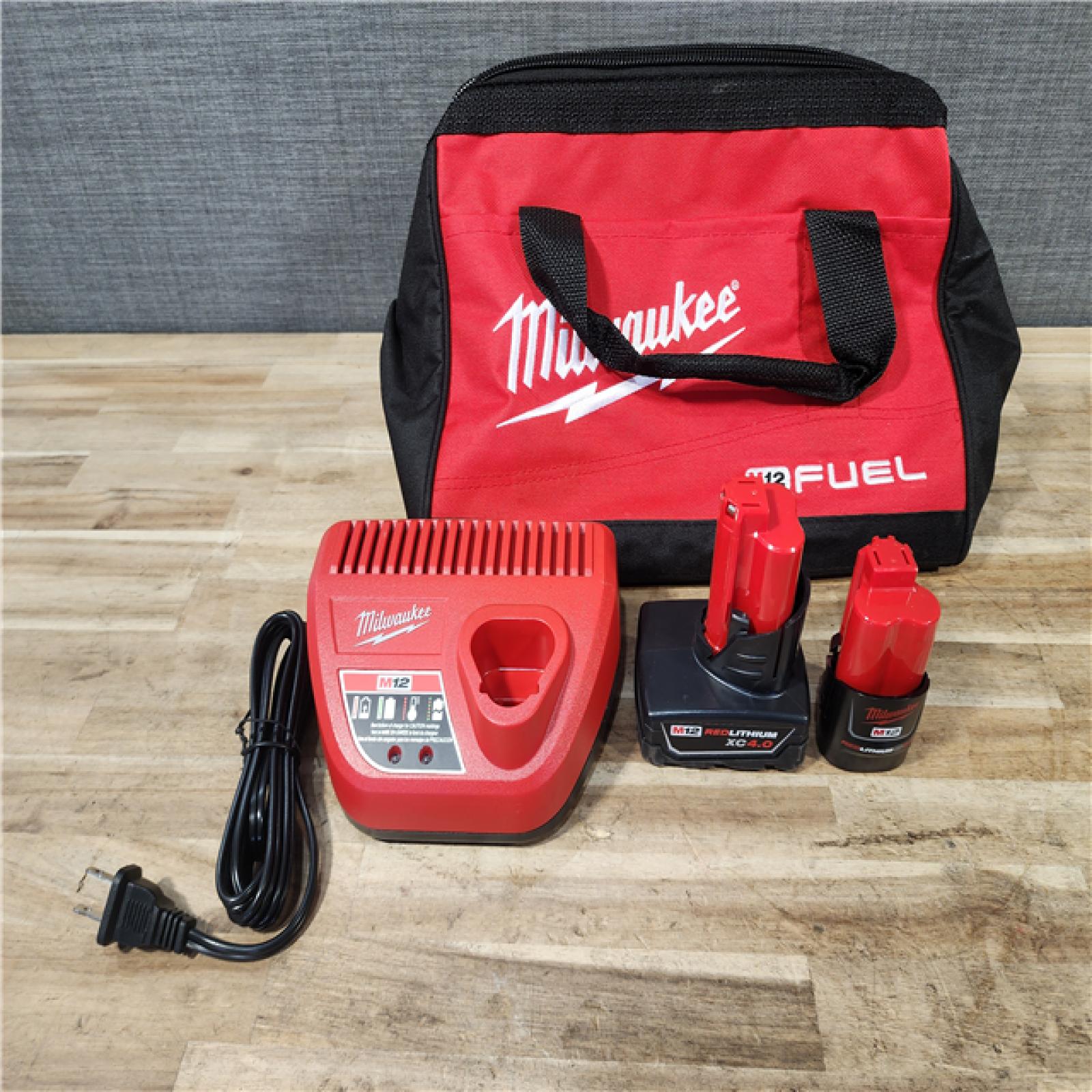 HOUSTON LOCATION - AS-IS (APPEARS LIKE NEW) Milwaukee FUEL 12-Volt Lithium-Ion Brushless Cordless Hammer Drill and Impact Driver Combo Kit