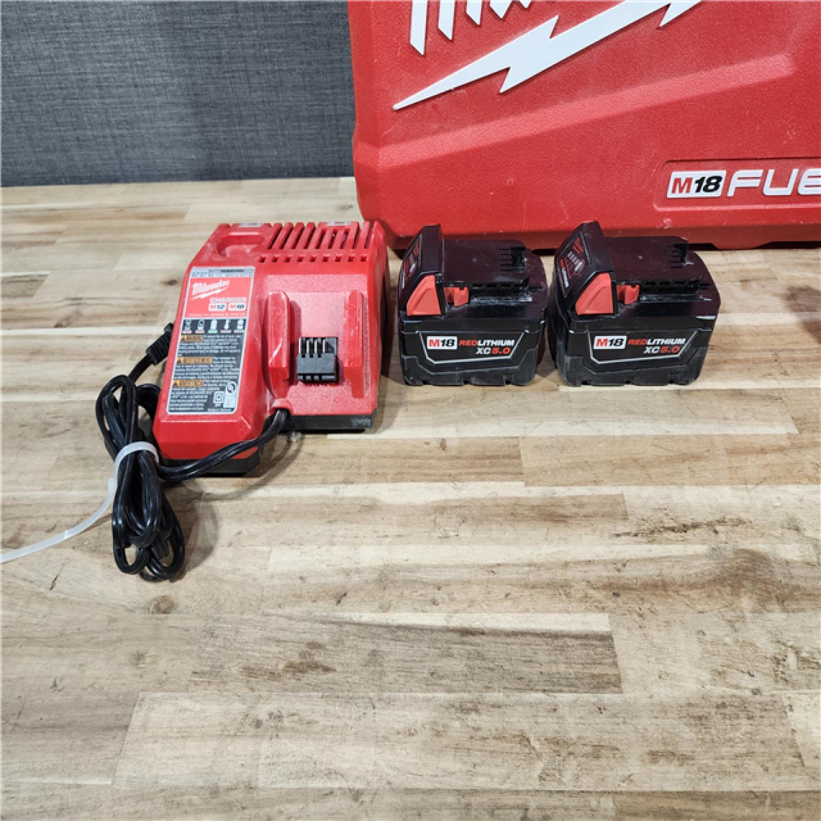 HOUSTON LOCATION - AS-IS Milwaukee FUEL 18V Lithium-Ion Brushless Cordless Hammer Drill and Impact Driver Combo Kit