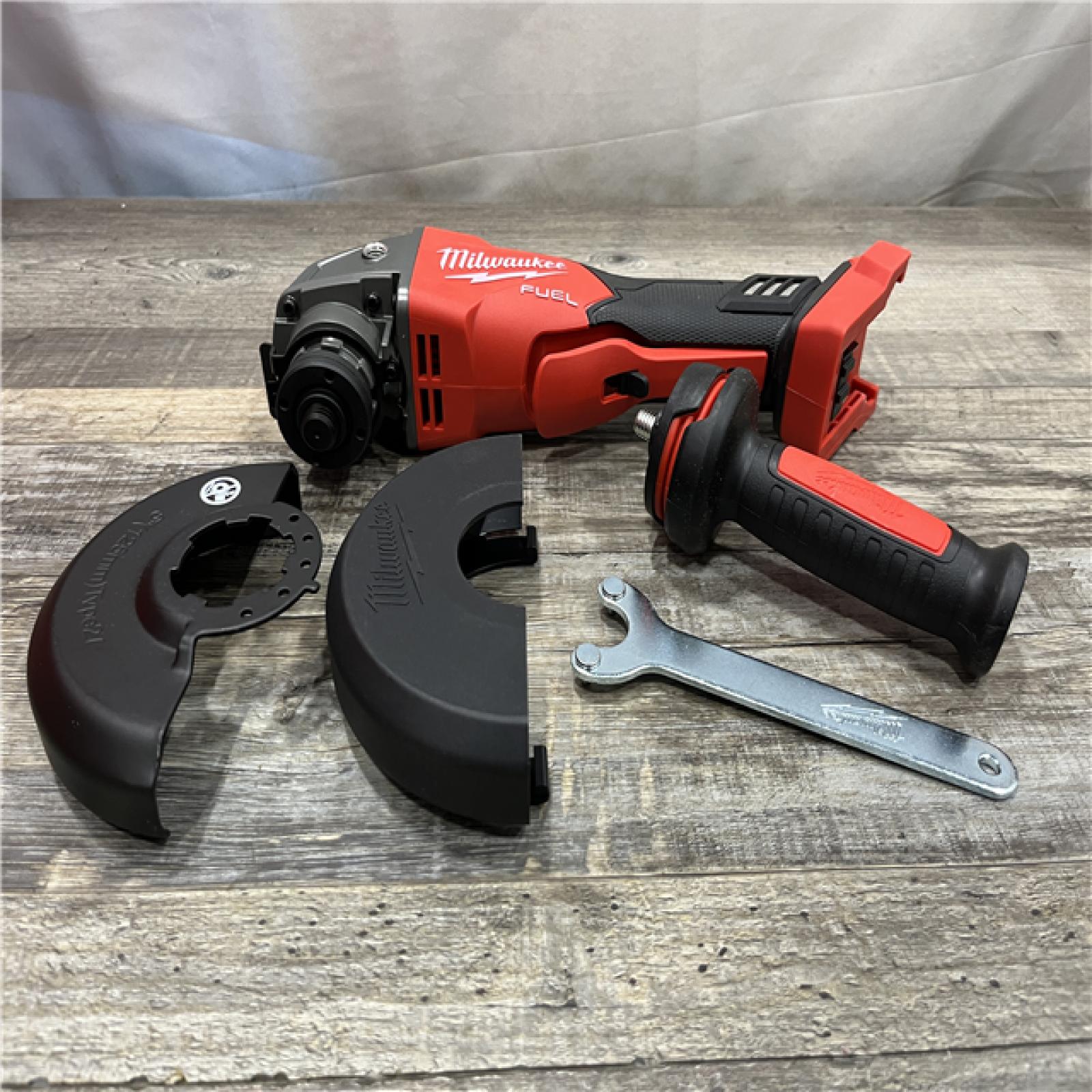 AS-IS Milwaukee FUEL 18V Lithium-Ion Brushless Cordless 4-1/2 in./5 in. Grinder w/Paddle Switch (Tool-Only)