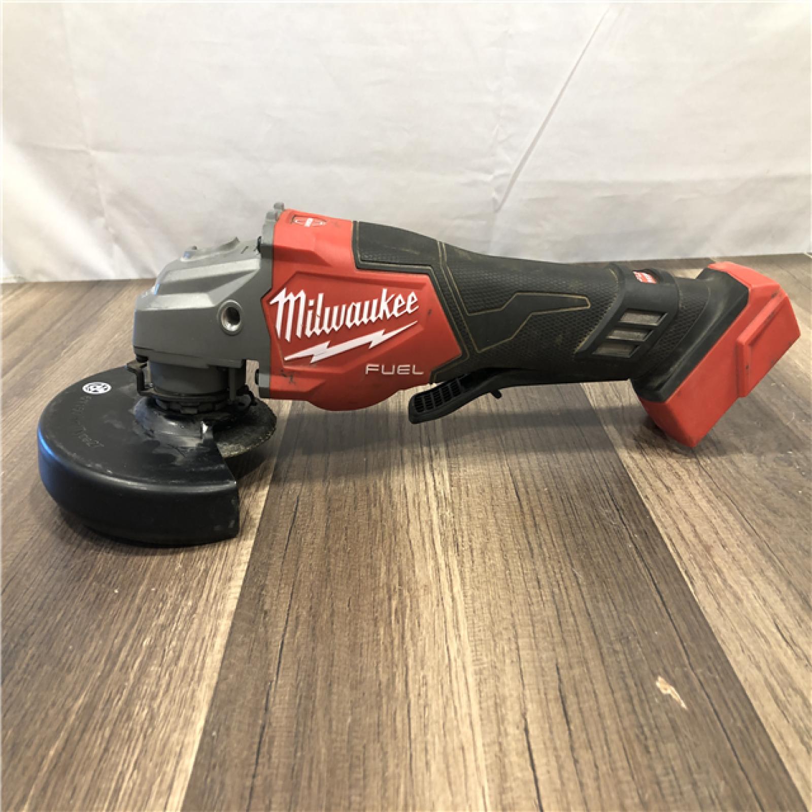 AS-IS Milwaukee  FUEL 18-Volt Lithium-Ion Brushless Cordless 4-1/2 in./6 in. Braking Grinder with Paddle Switch (Tool-Only)