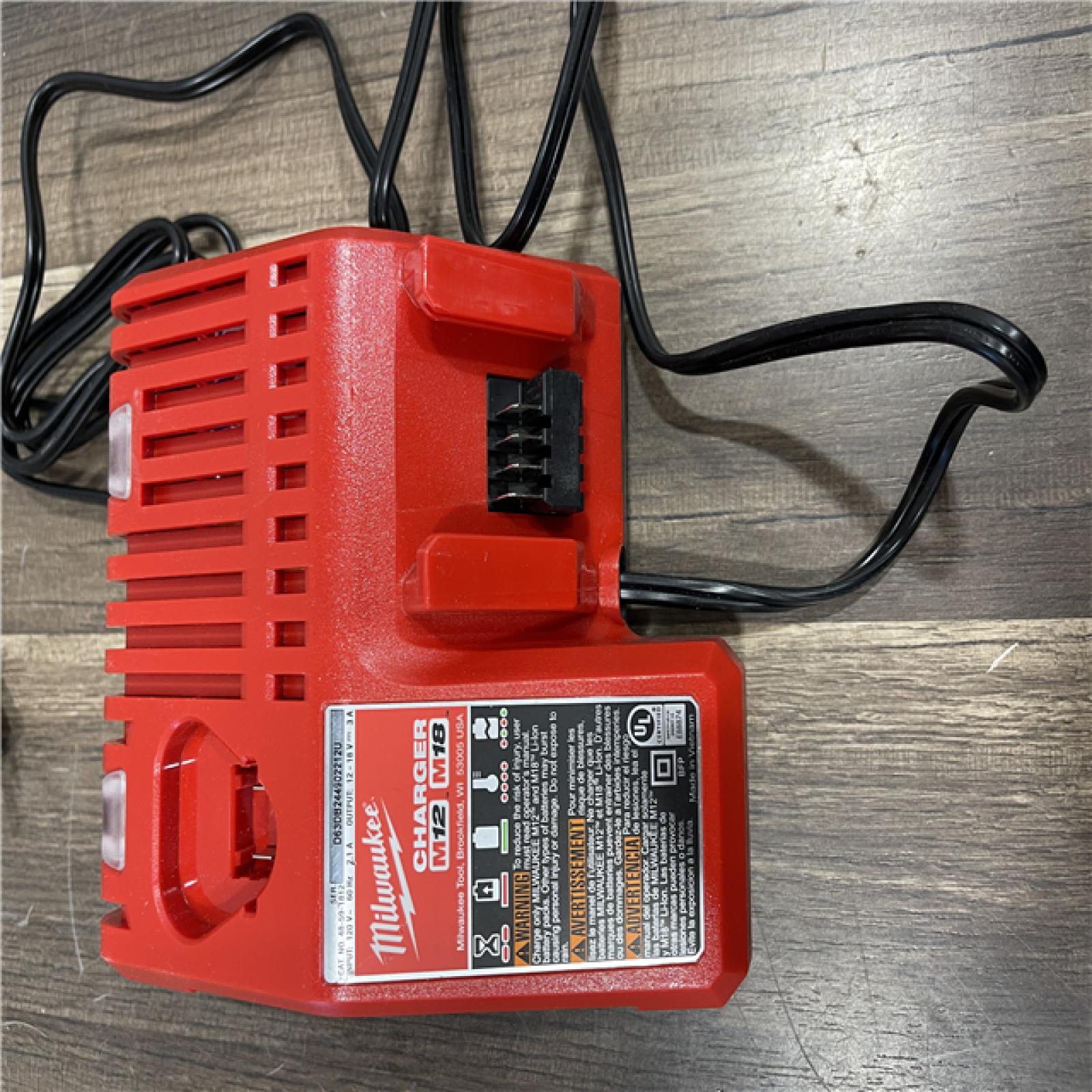 AS-IS Milwaukee 18-Volt Lithium-Ion XC Starter Kit with One 5.0Ah Battery and Charger