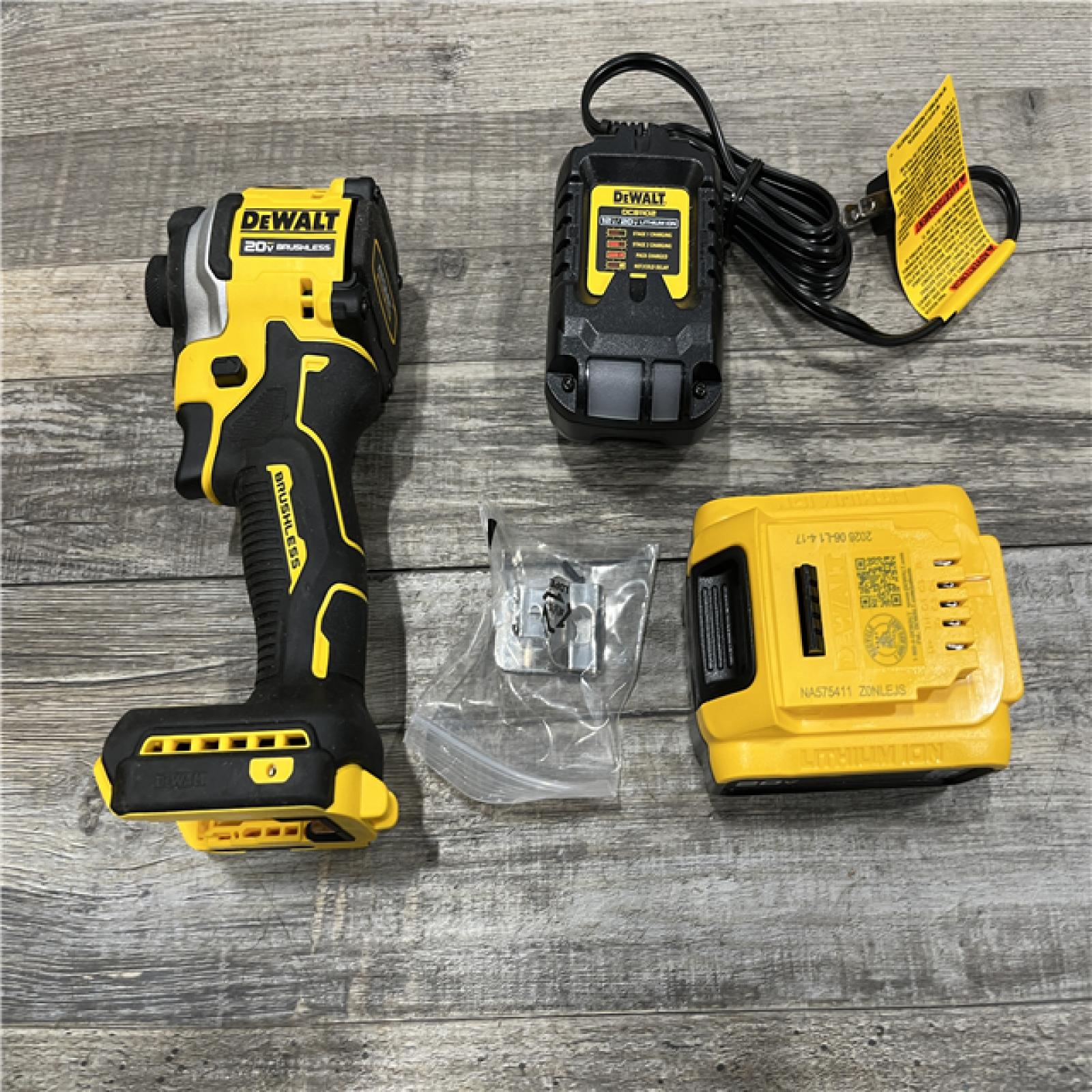 AS-IS DEWALT ATOMIC 20V MAX Lithium-Ion Cordless 1/4 in. Brushless Impact Driver Kit
