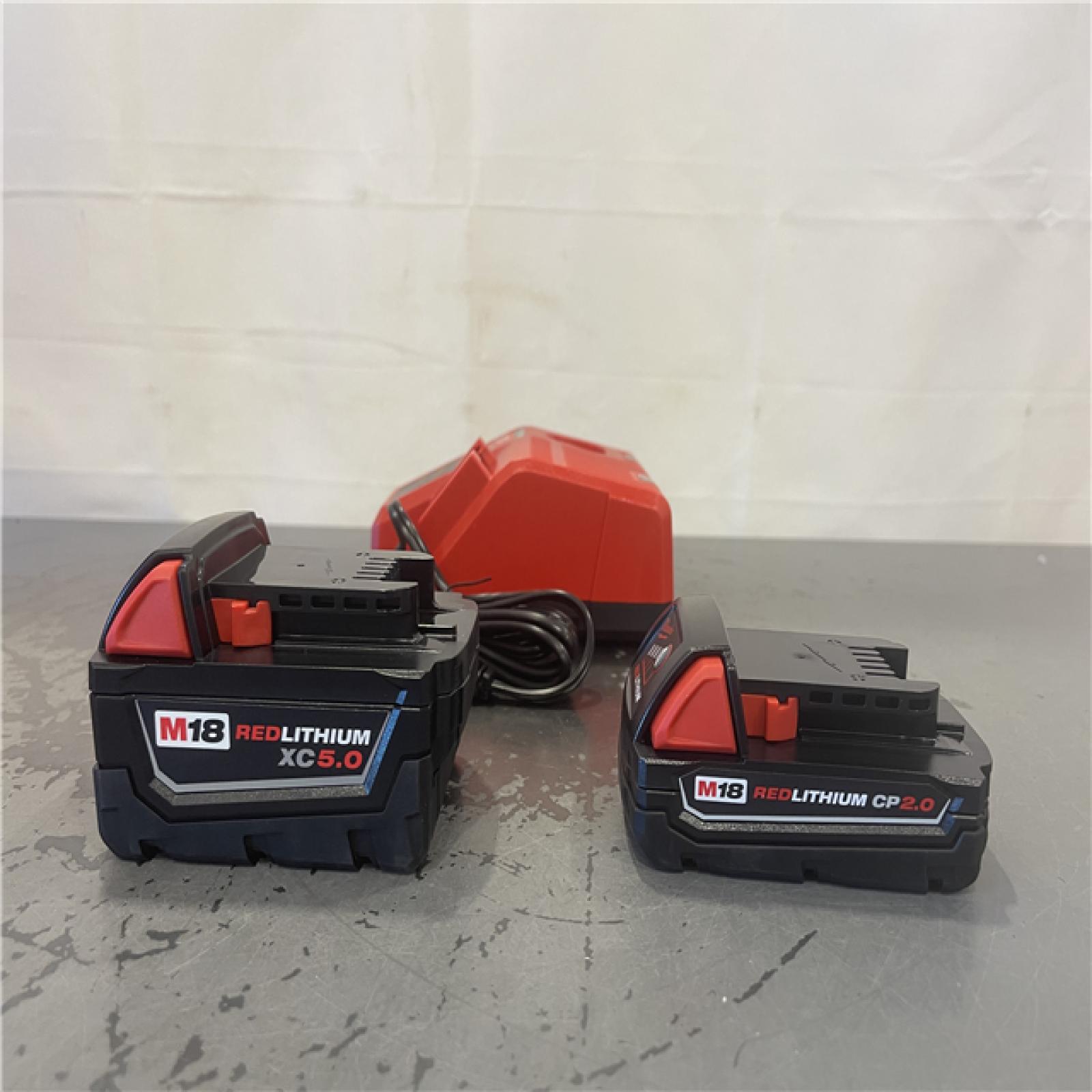AS-IS- Milwaukee M18 18-Volt Lithium-Ion Starter Kit with One 5.0 Ah and One 2.0 Ah Battery and Charger