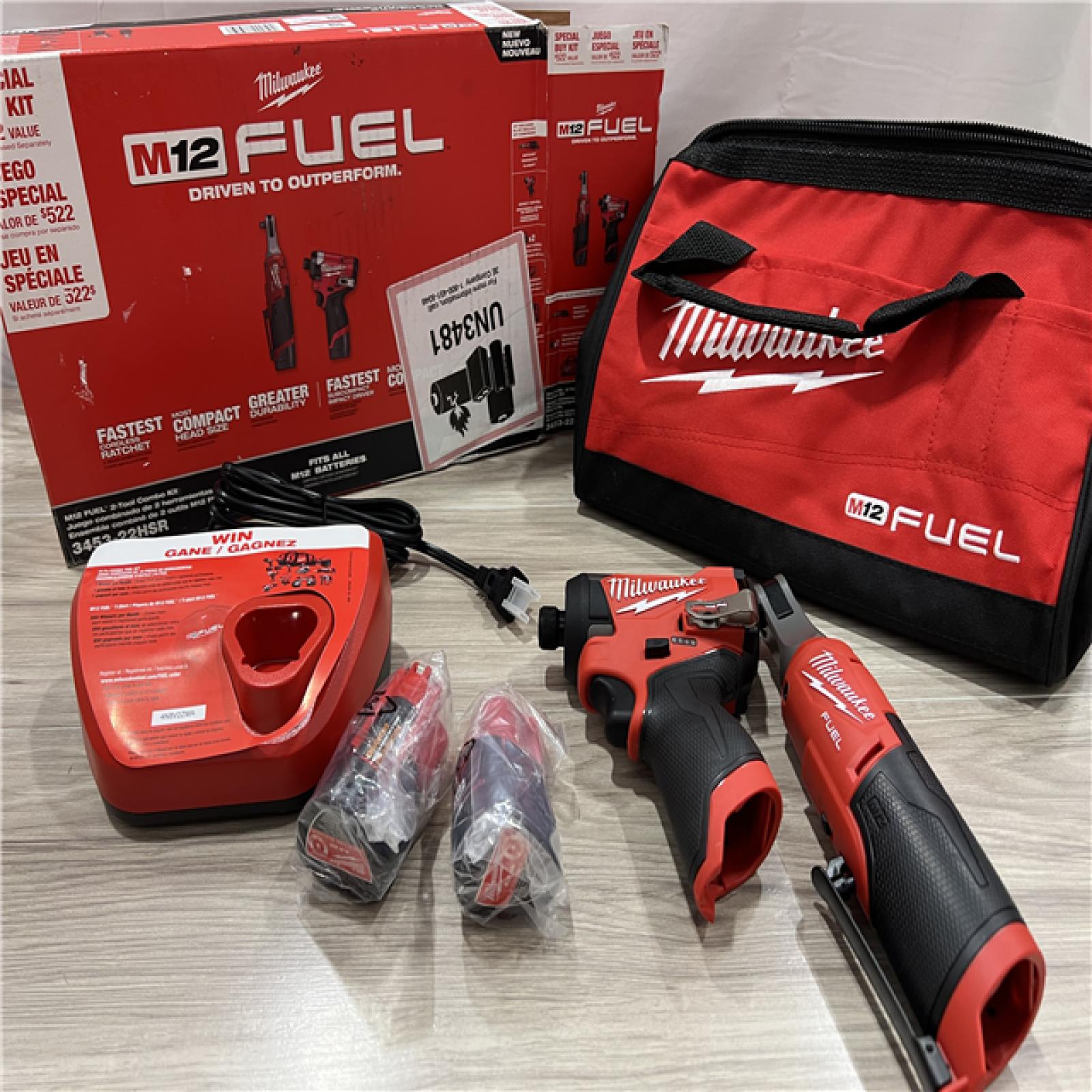 AS-IS Milwaukee FUEL 12V Lithium-Ion Cordless 3/8 in. Ratchet and 1/4 in. Impact Driver Kit