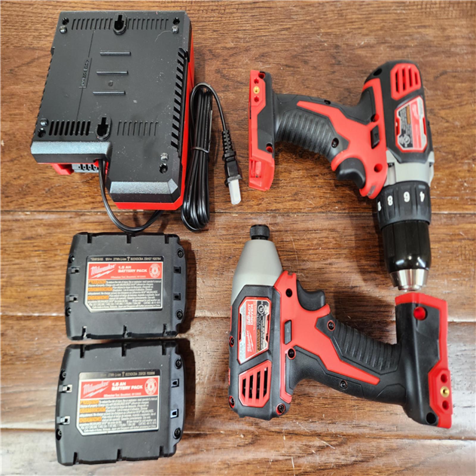 AS-IS Milwaukee M18 Brushed Cordless Drill Driver/Impact Driver (2-Tool) Combo Kit