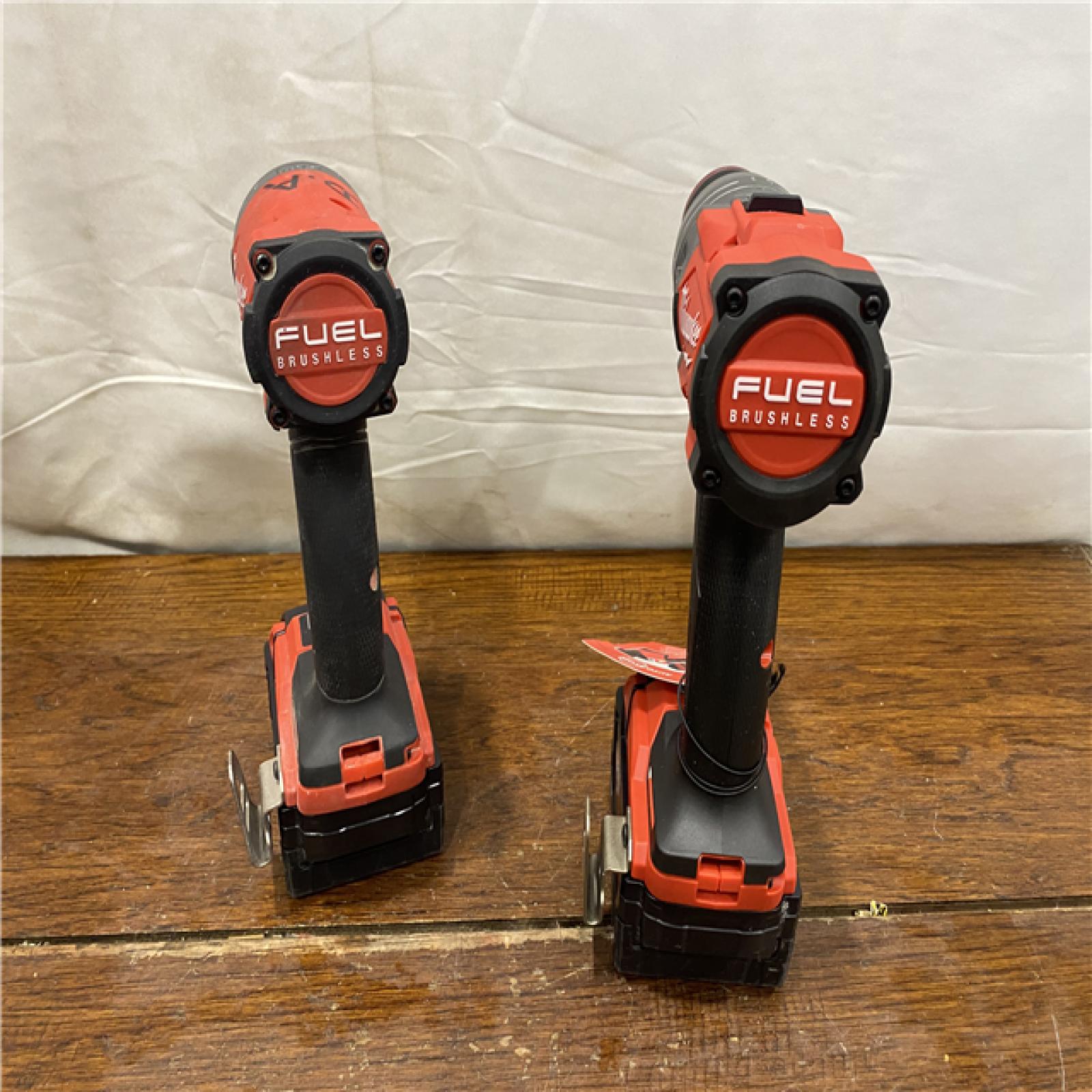 AS-IS MILWAUKEE M18 FUEL 18V Lithium-Ion Brushless Cordless Hammer Drill and Impact Driver Combo Kit (2-Tool) with 2 Batteries
