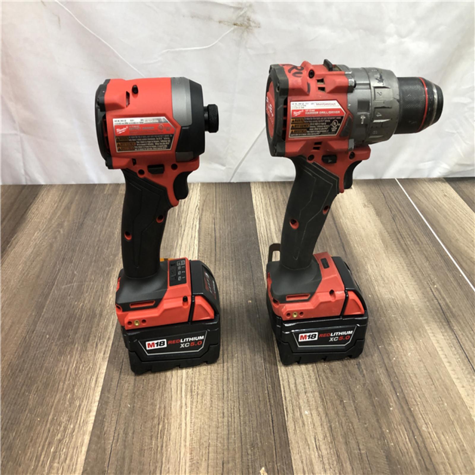 AS-IS Milwaukee FUEL 18V Lithium-Ion Brushless Cordless Hammer Drill and Impact Driver Combo Kit