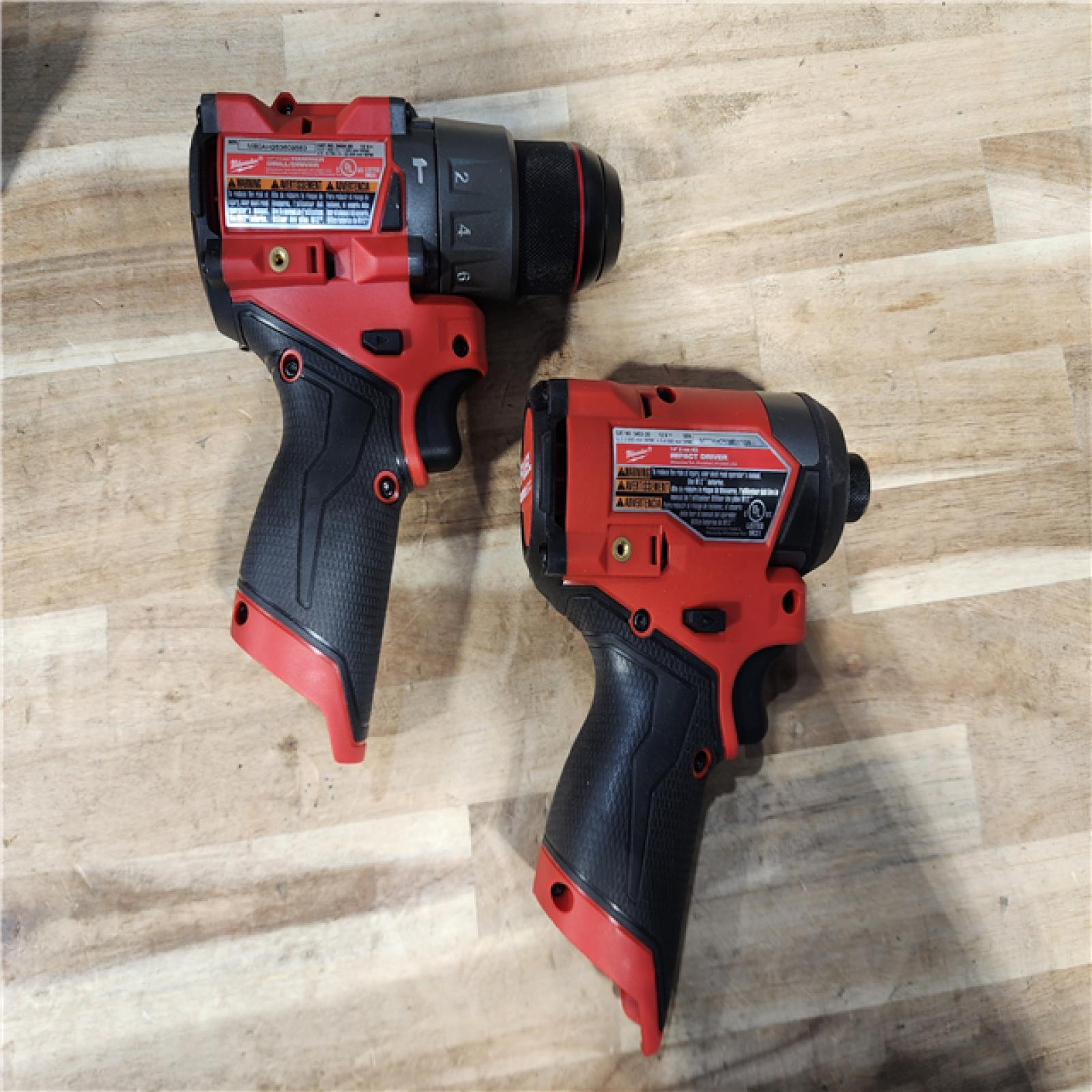 HOUSTON LOCATION - AS-IS Milwaukee  FUEL 12-Volt Lithium-Ion Brushless Cordless Hammer Drill and Impact Driver Combo Kit