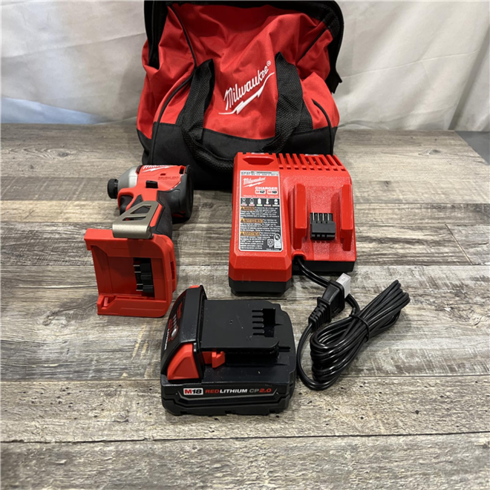 AS-IS Milwaukee 18-Volt Lithium-Ion Compact Brushless Cordless 1/4 in. Impact Driver Kit