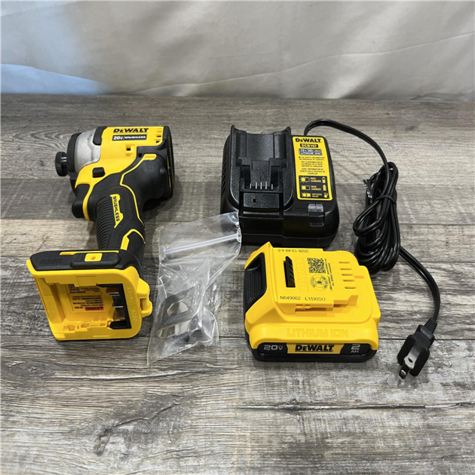 AS-IS DEWALT Atomic 20V Max Lithium-Ion Brushless Cordless Compact 1/4 in. Impact Driver Kit