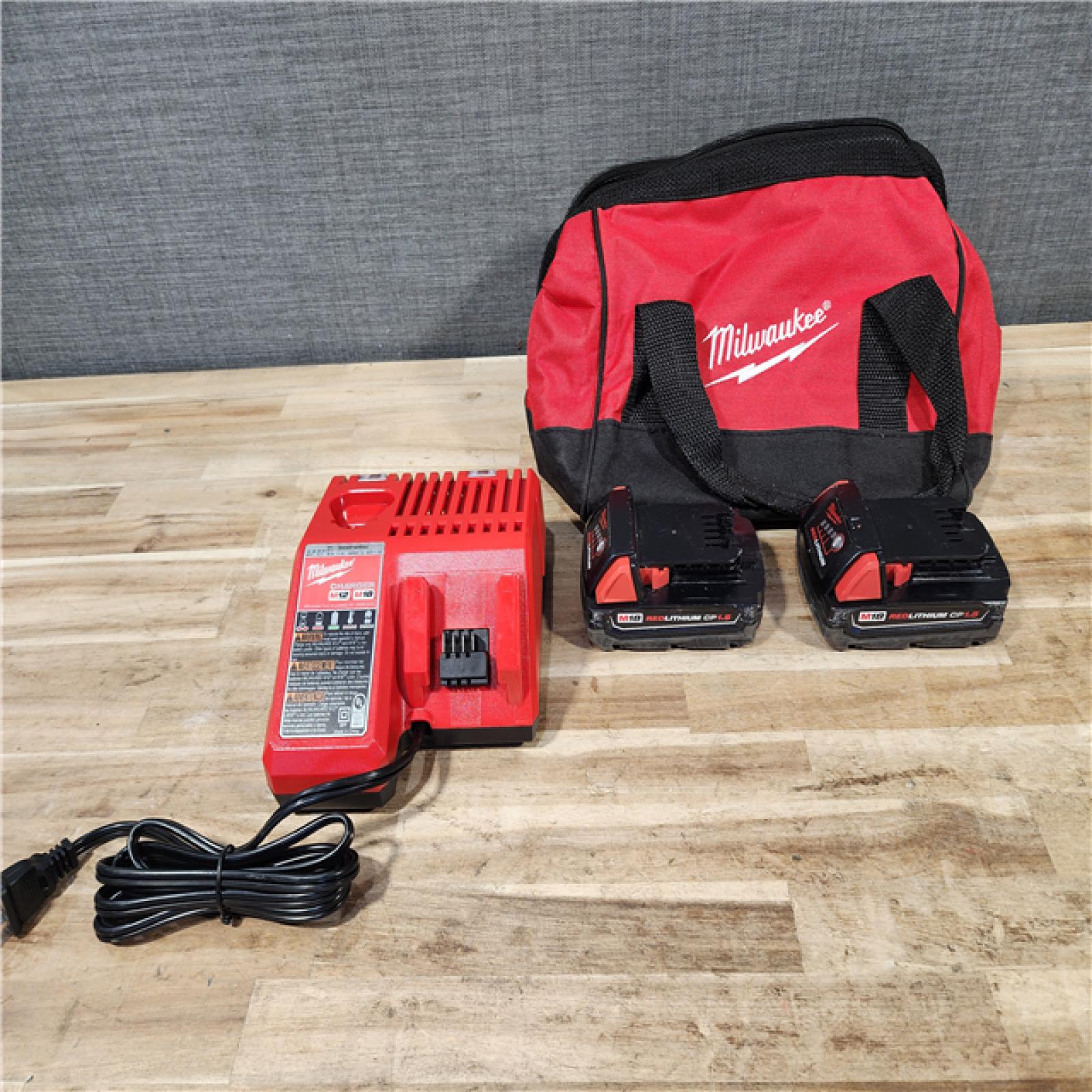 HOUSTON LOCATION - AS-IS Milwaukee 18V Lithium-Ion Cordless Drill Driver/Impact Driver Combo Kit