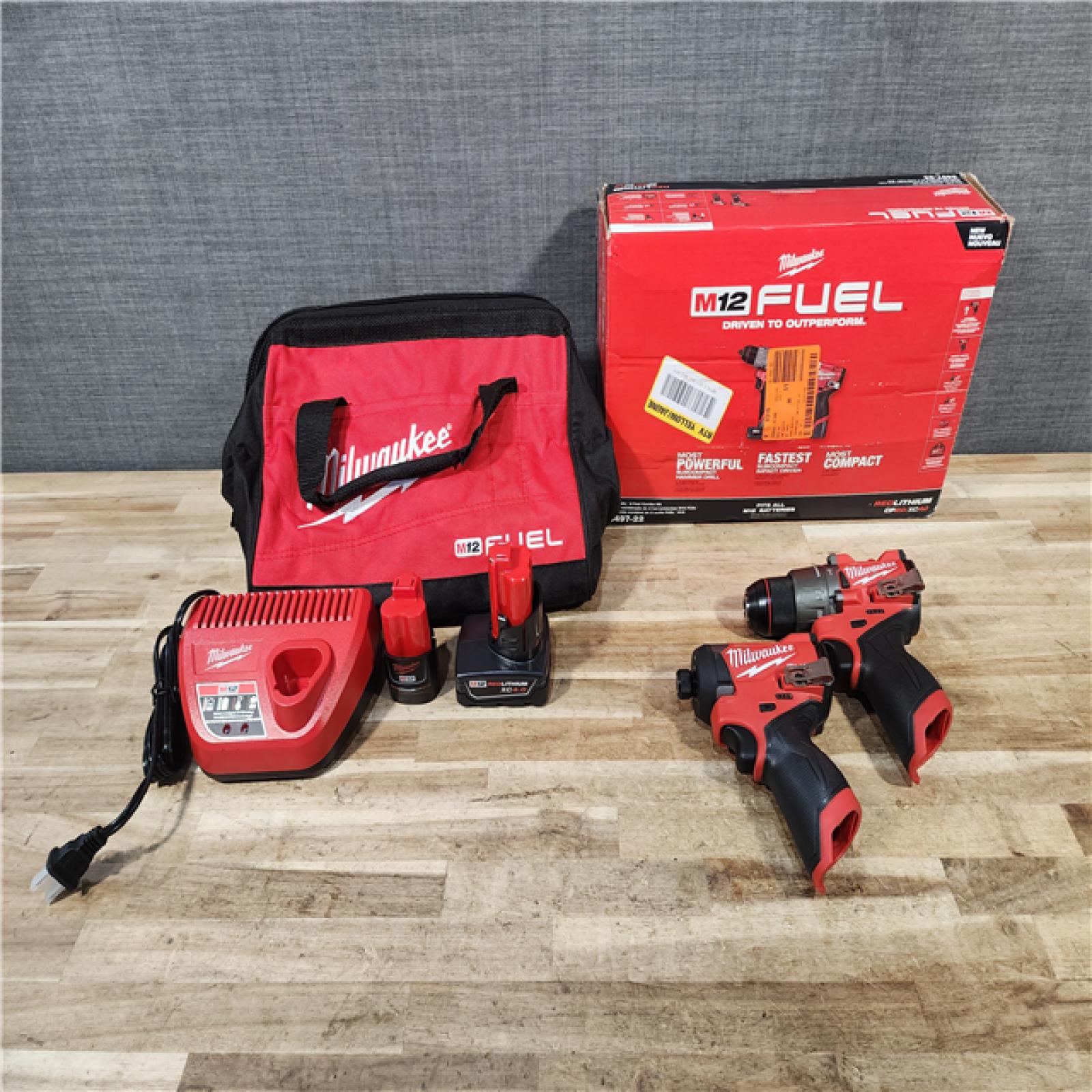 HOUSTON LOCATION - AS-IS Milwaukee FUEL 12-Volt Lithium-Ion Brushless Cordless Hammer Drill and Impact Driver Combo Kit