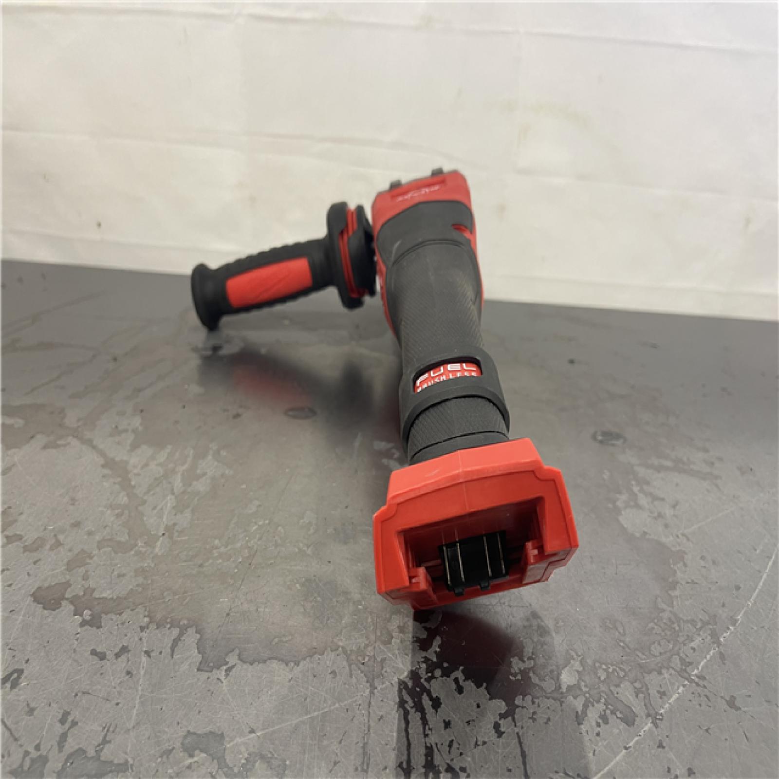 AS-IS- Milwaukee M18 FUEL 4-1/2-6 Cordless Braking Grinder  Paddle Switch (Tool-Only)