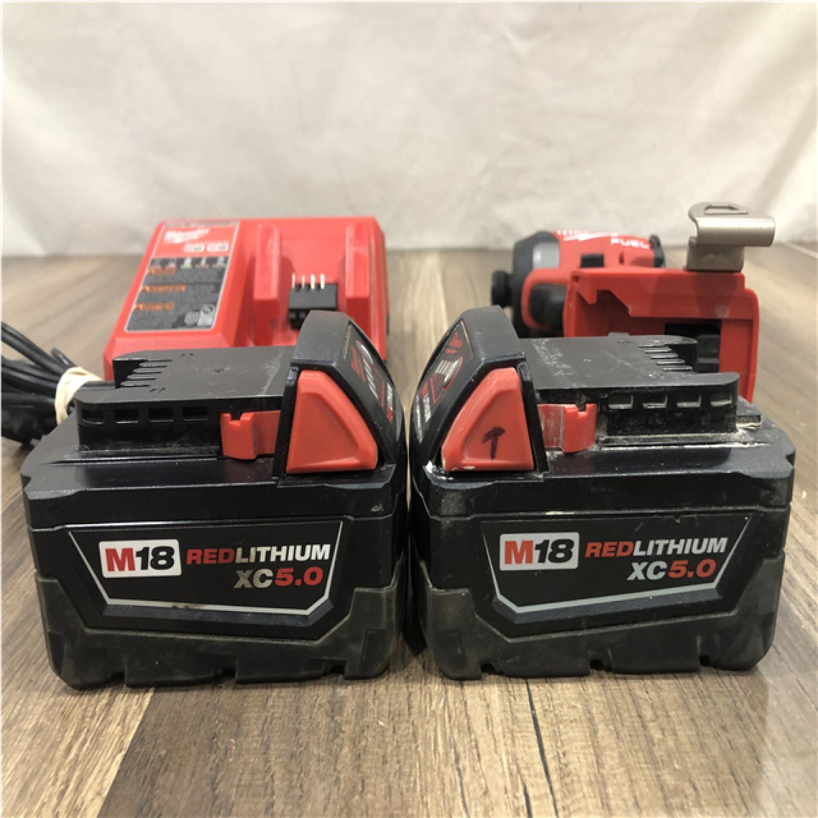 AS-IS Milwaukee FUEL 18V Lithium-Ion Brushless Cordless 1/4 in. Hex Impact Driver Kit