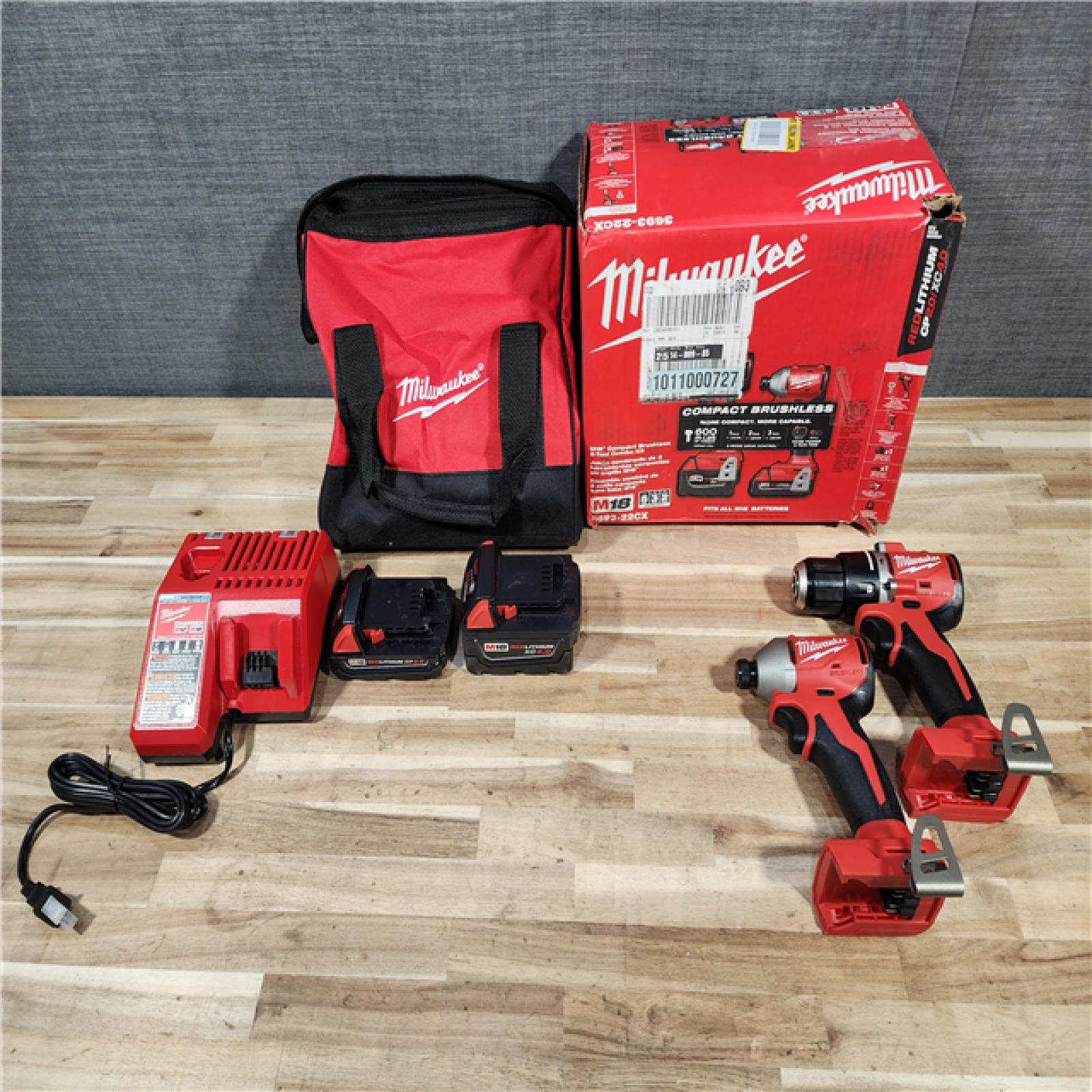 HOUSTON LOCATION - AS-IS Milwaukee 18-Volt Lithium-Ion Brushless Cordless Compact Hammer Drill/Impact Combo Kit