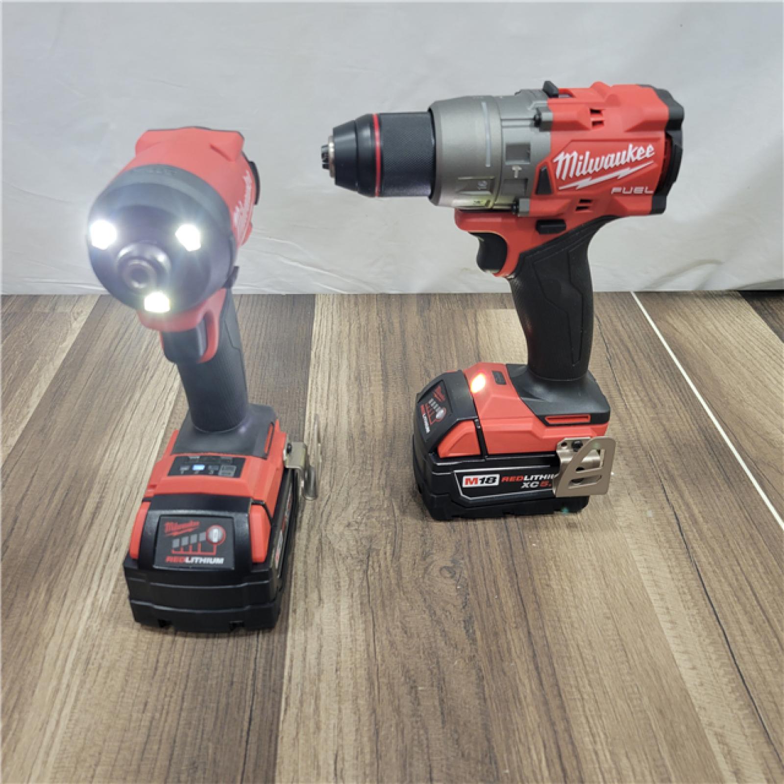 AS-IS MILWAUKEE M18 FUEL 18V Lithium-Ion Brushless Cordless Hammer Drill and Impact Driver Combo Kit (2-Tool) with 2 Batteries