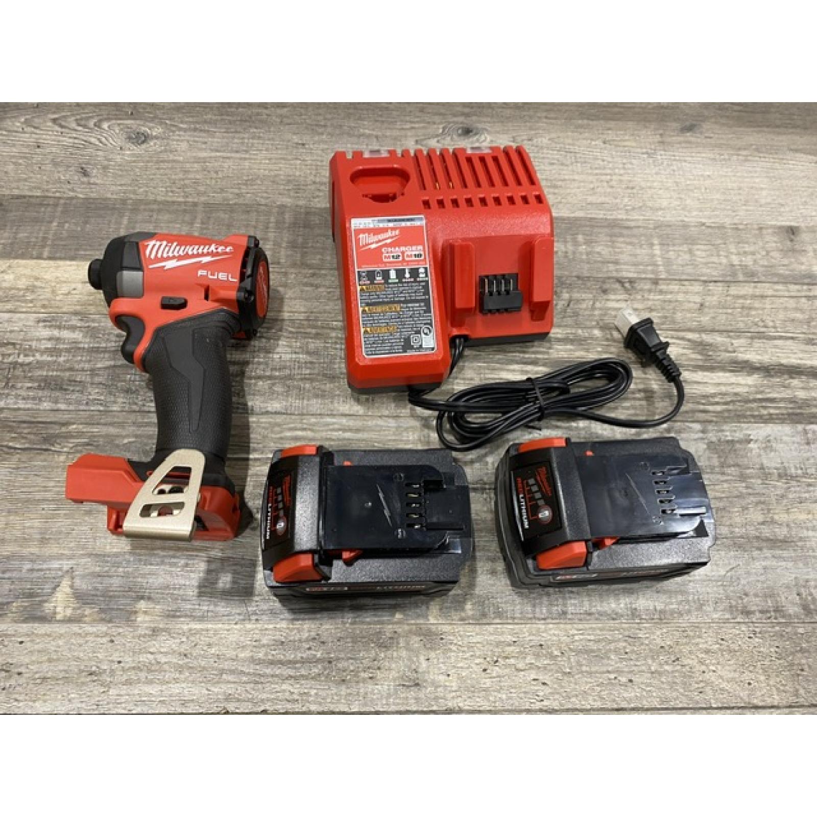 AS-IS Milwaukee FUEL 18V Lithium-Ion Brushless Cordless 1/4 in. Hex Impact Driver Kit