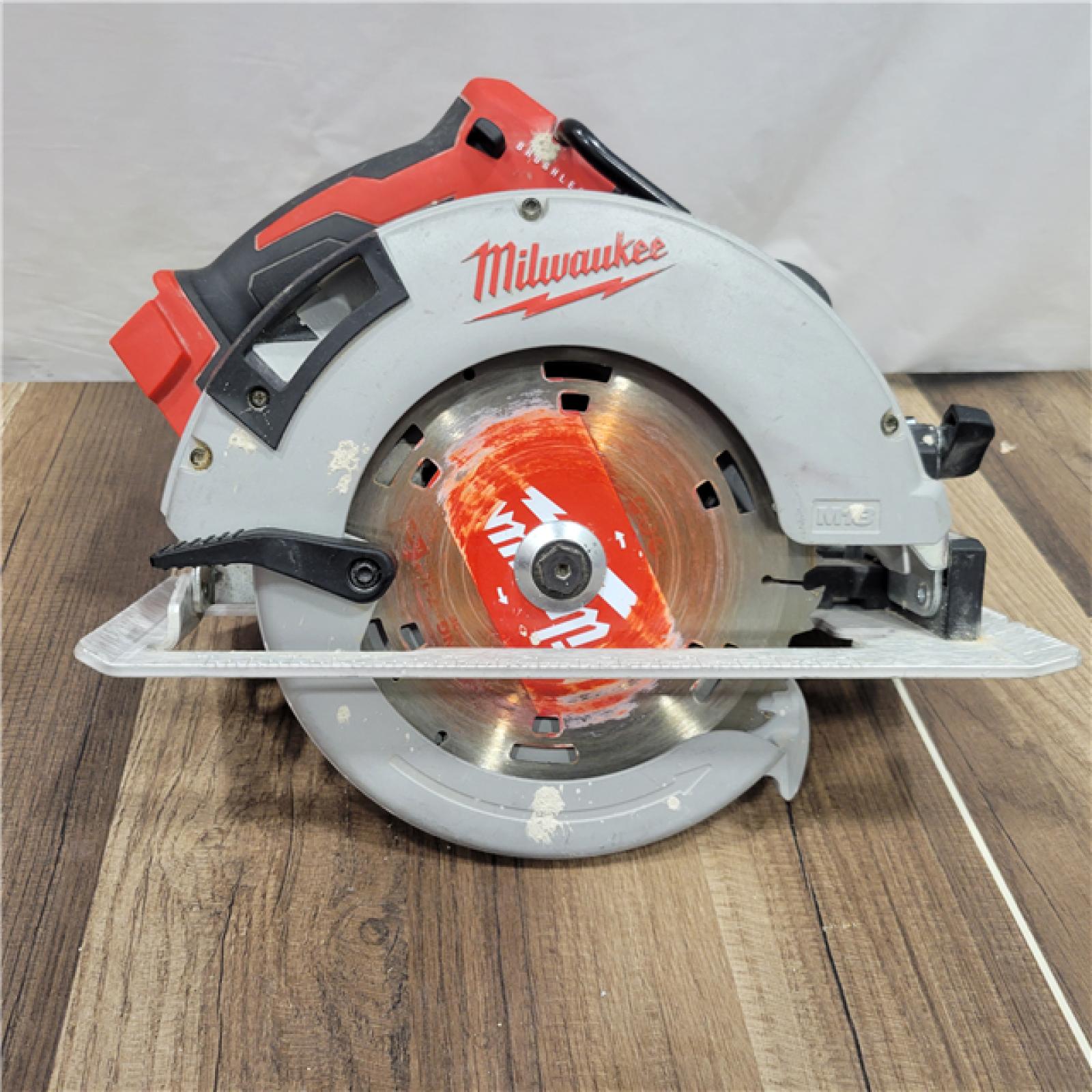 AS-IS Milwaukee M18 18-Volt Lithium-Ion Brushless Cordless Combo Kit (4-Tool) with 2-Batteries, 1-Charger and Tool Bag