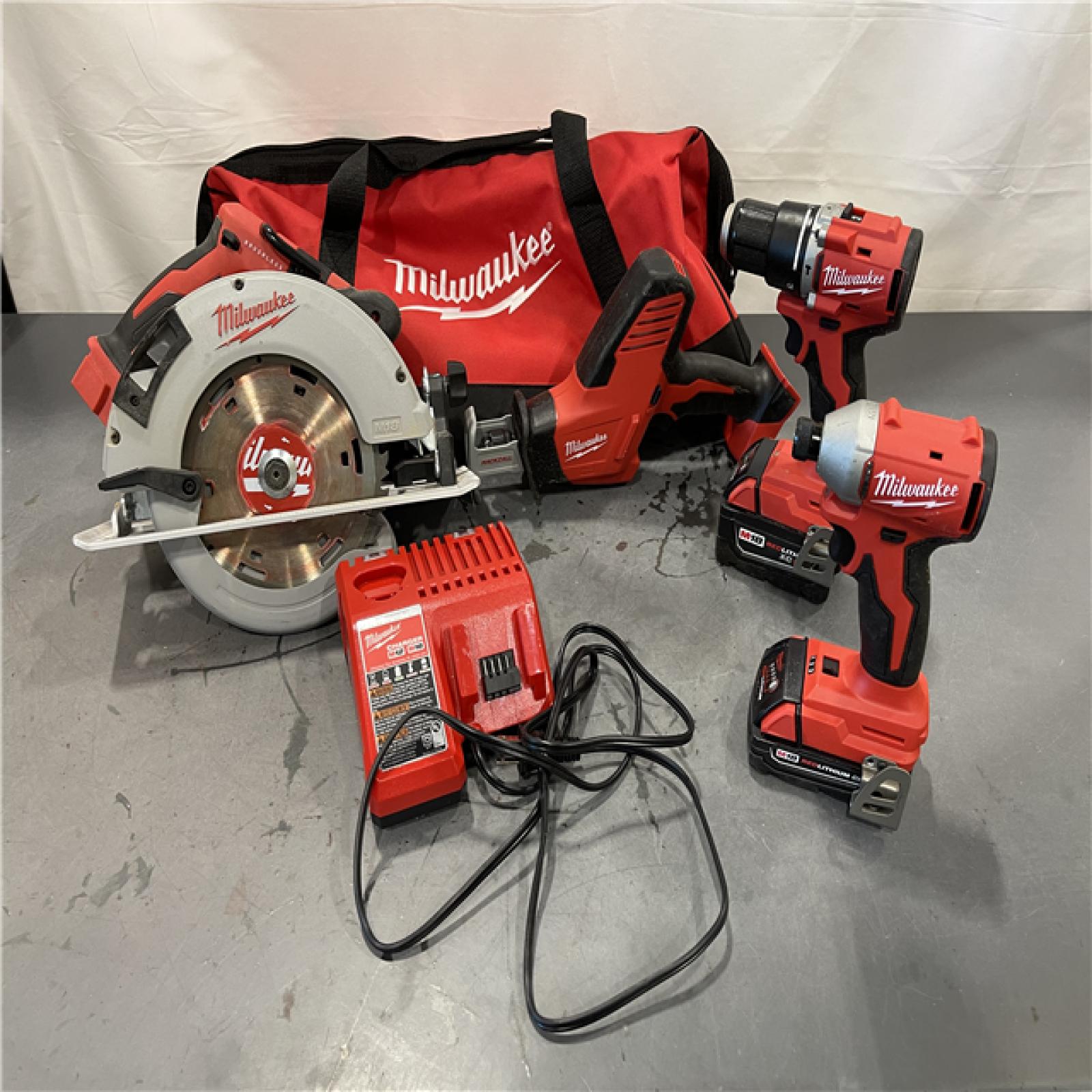 AS-IS - Milwaukee M18 18-Volt Lithium-Ion Brushless Cordless Combo 4 Tool Kit