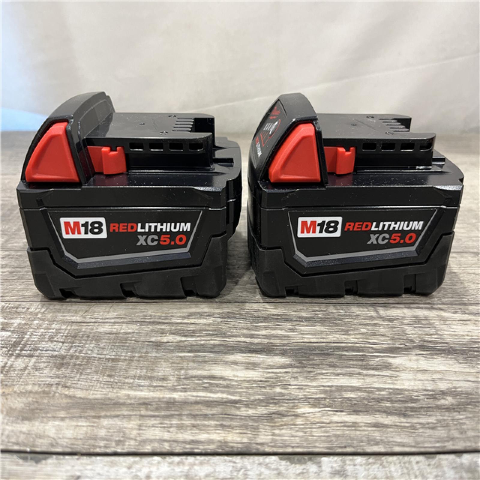 AS-IS Milwaukee 18-Volt Lithium-Ion XC Starter Kit with (2) 5.0Ah Batteries and Charger