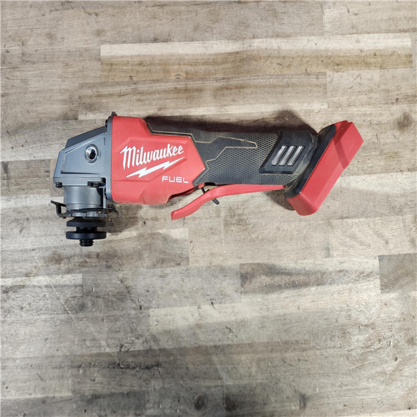 HOUSTON LOCATION - AS-IS Milwaukee M18 FUEL 18V Lithium-Ion Brushless Cordless 4-1/2 in./5 in. Grinder with Variable Speed & Paddle Switch (Tool-Only)
