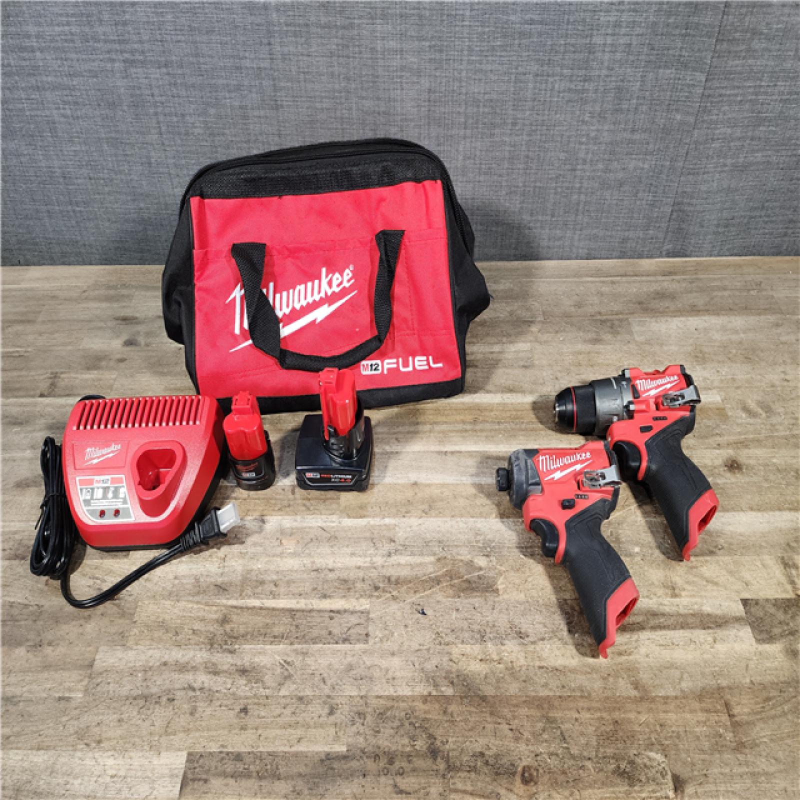 HOUSTON LOCATION - AS-IS Milwaukee FUEL 12-Volt Lithium-Ion Brushless Cordless Hammer Drill and Impact Driver Combo Kit