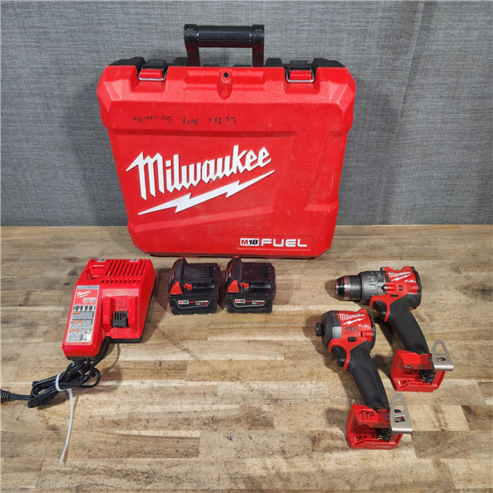 HOUSTON LOCATION - AS-IS Milwaukee FUEL 18V Lithium-Ion Brushless Cordless Hammer Drill and Impact Driver Combo Kit