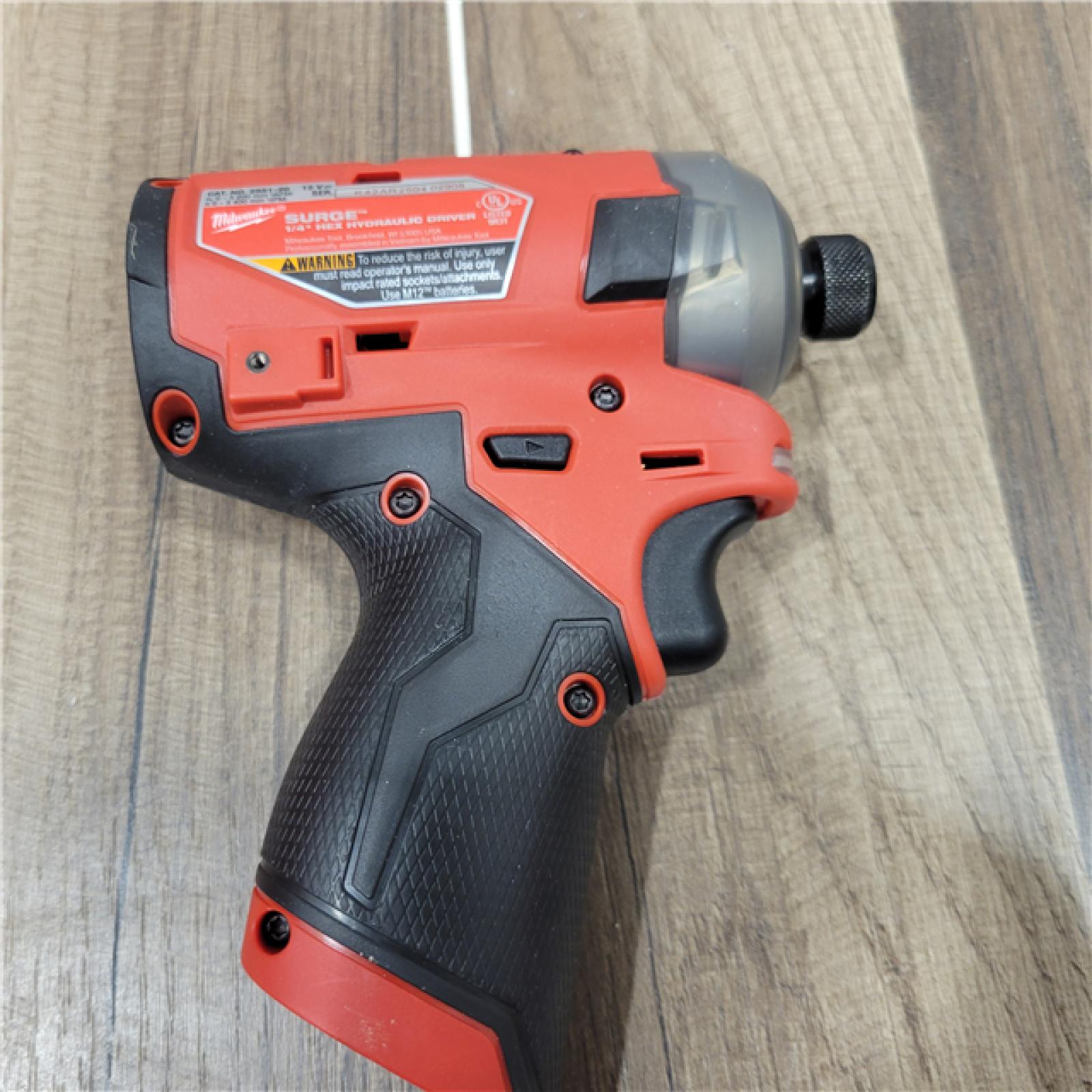 AS-IS Milwaukee 2M12 FUEL SURGE 12V Lithium-Ion Brushless Cordless 1/4 in. Hex Impact Driver Compact Kit W/Two 2.0Ah Batteries, Bag