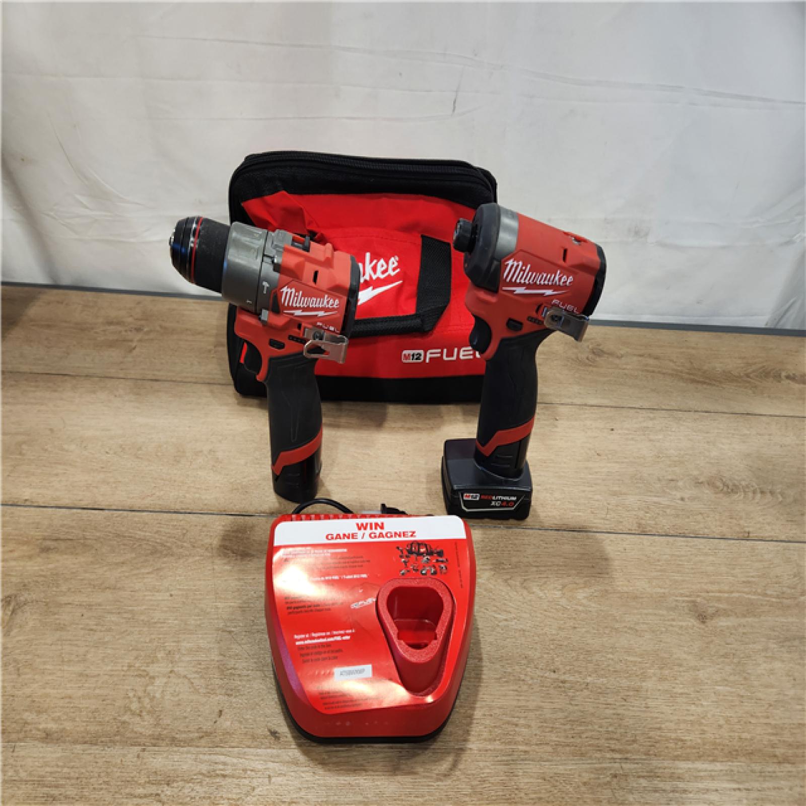 AS-IS- Milwaukee FUEL 12-Volt Lithium-Ion Brushless Cordless Hammer Drill and Impact Driver Combo Kit