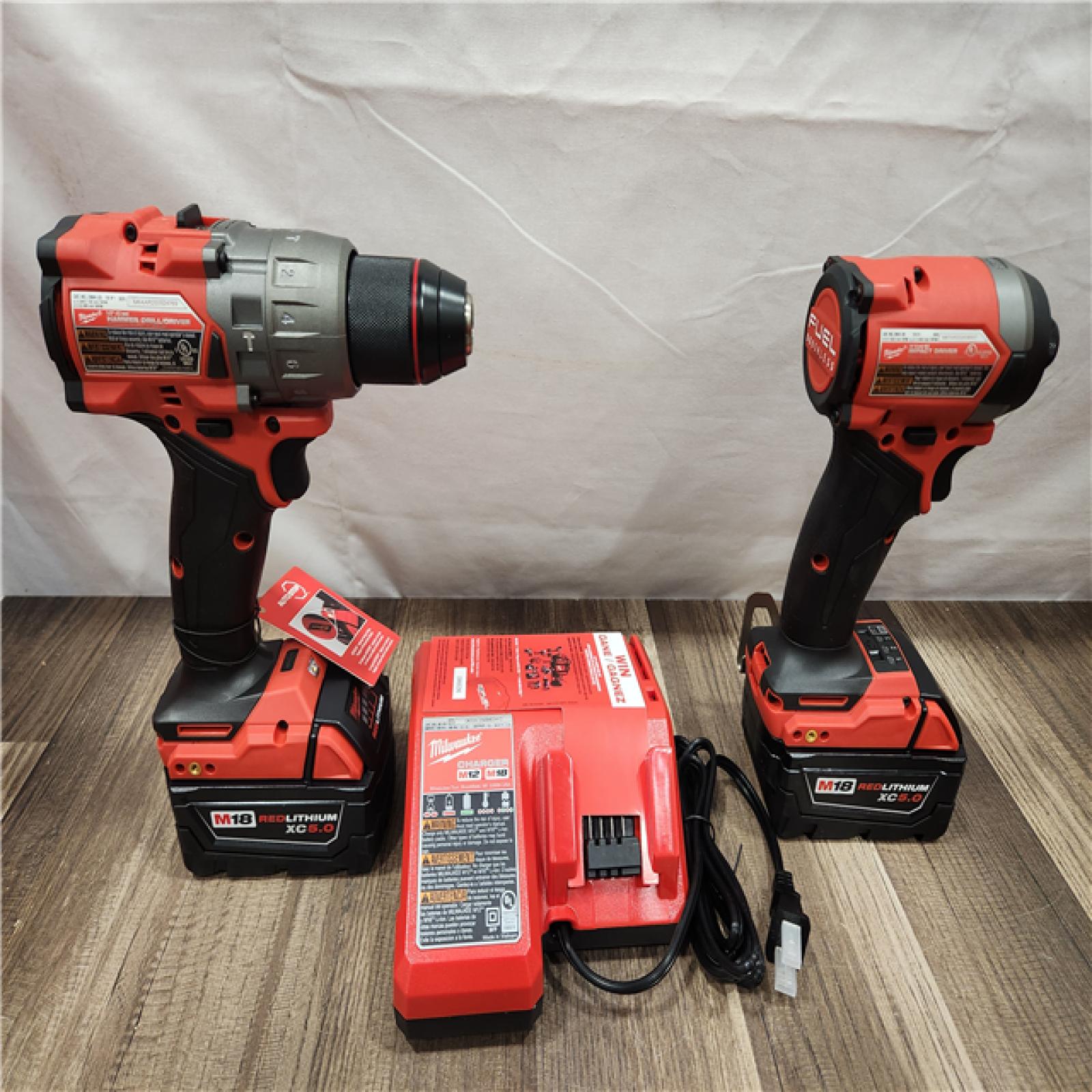 AS-IS- MILWAUKEE FUEL 18V Lithium-Ion Brushless Cordless Hammer Drill and Impact Driver Combo Kit