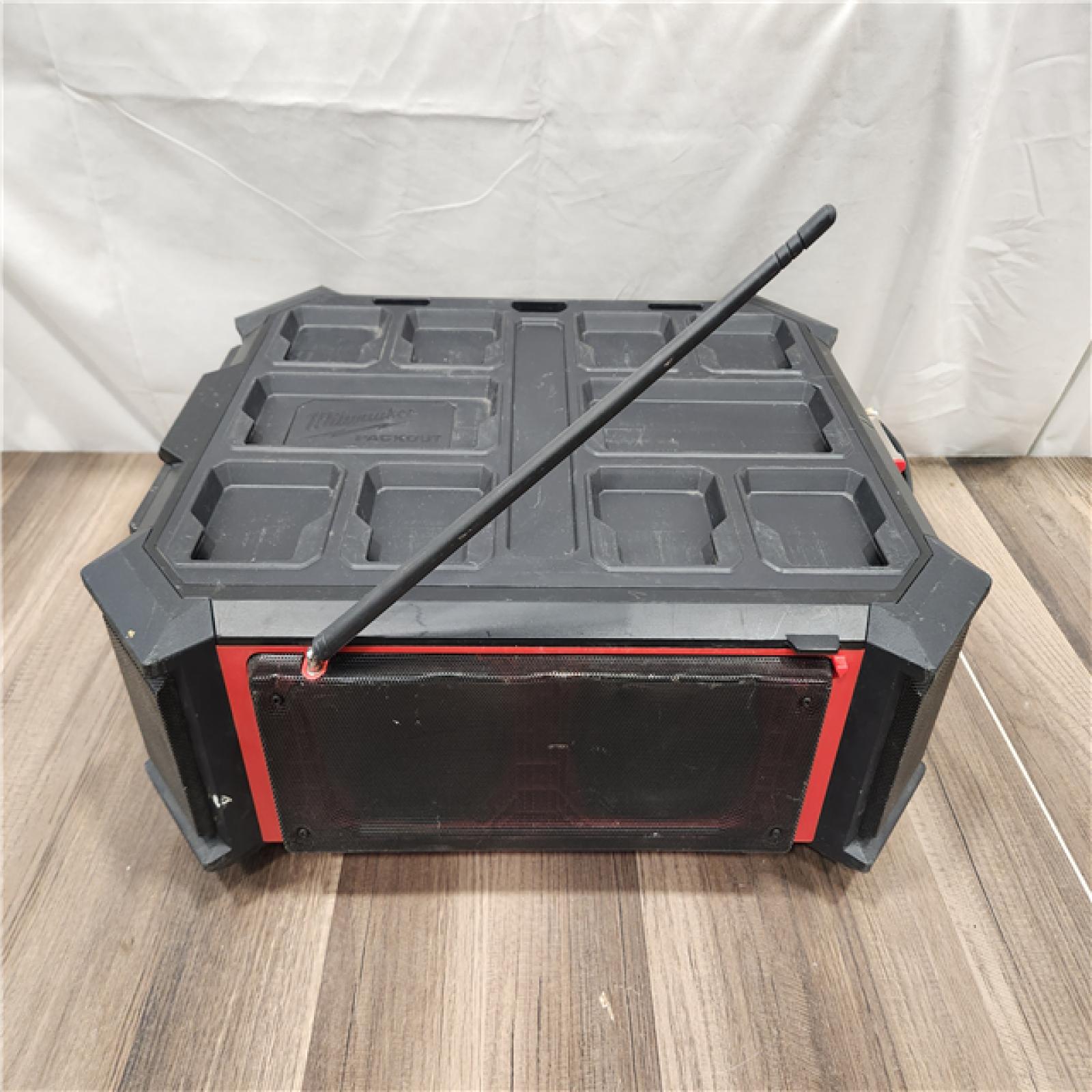 AS-IS- Milwaukee 18V M18 PACKOUT Lithium-Ion Cordless Radio + Charger (Tool Only)
