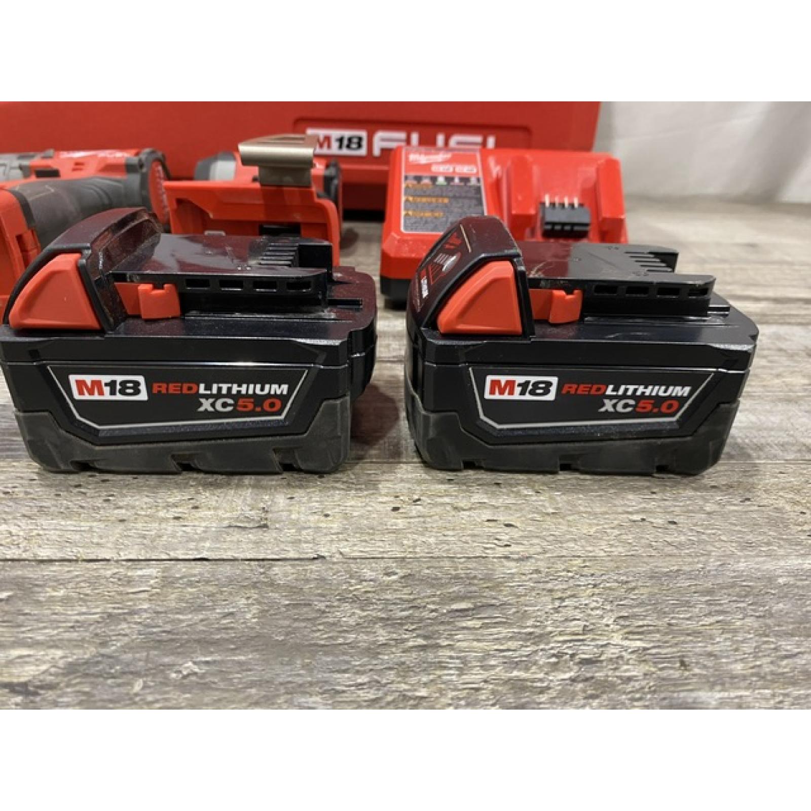 AS-IS Milwaukee FUEL 18V Lithium-Ion Brushless Cordless Hammer Drill and Impact Driver Combo Kit